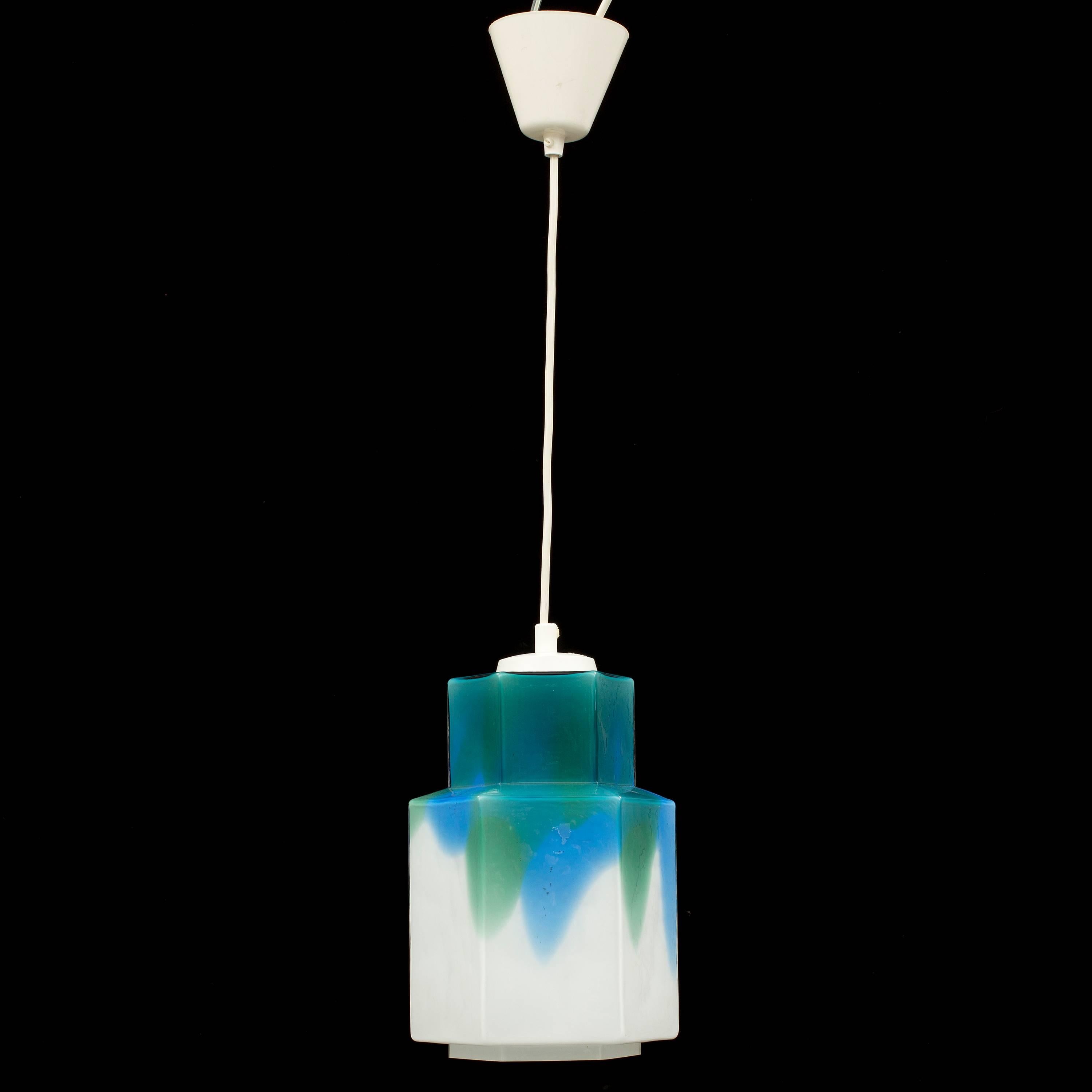 A pendant designed by Helena Tynell for Flygsfors, Sweden, circa 1960s.
Glass shade height 10