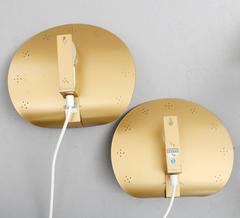 Paire d'appliques murales dans le style de Paavo Tynell