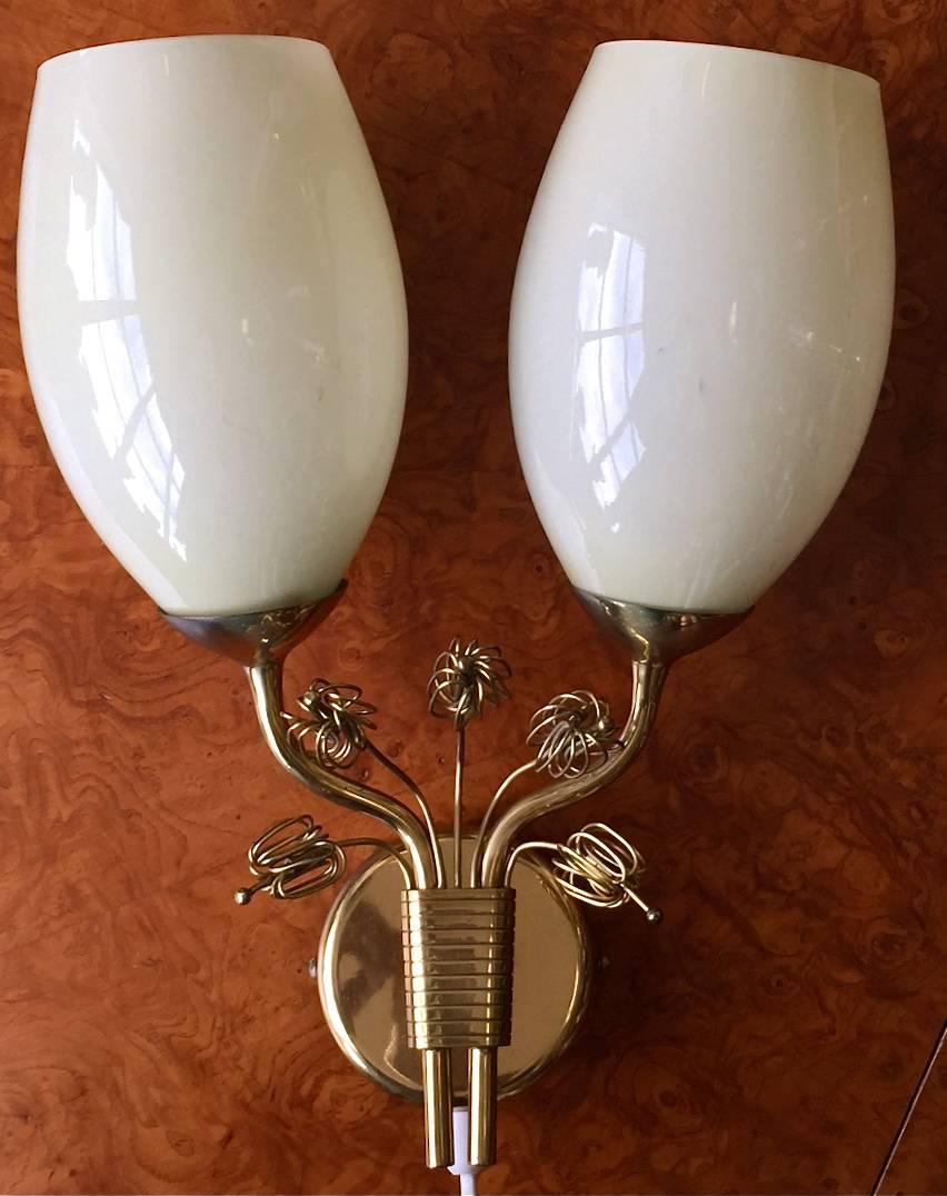 Rare large wall light designed by Paavo Tynell for Taito Oy, Finland, circa 1950s.
Original glass shades, marked OY TAITO A 9453.
Rewiring available upon request.