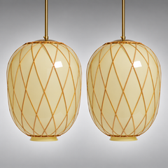 A pair of large ceiling lamps by Harald Notini