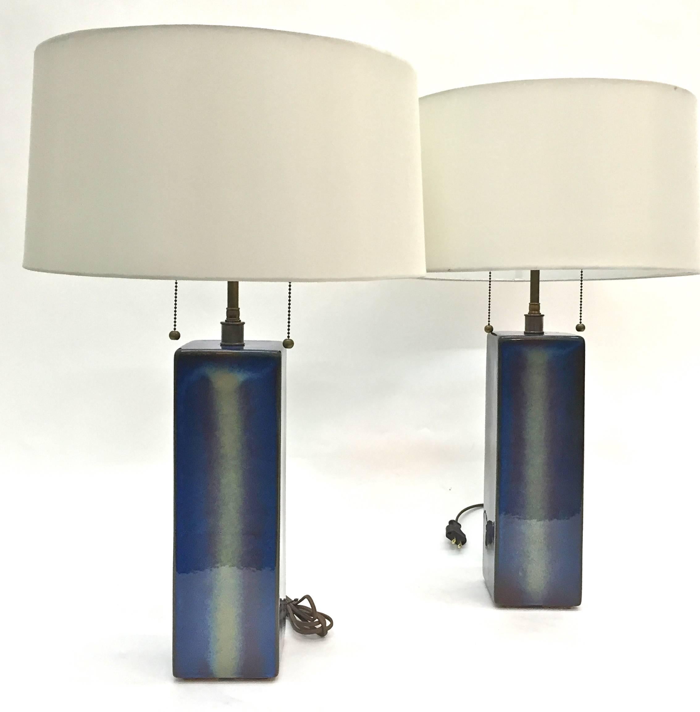 A pair of table lamp by Soholm Pottery, Denmark, circa 1960s. Glazed stoneware . Marked by manufacturer, signed by artist. Measures: Height 27
