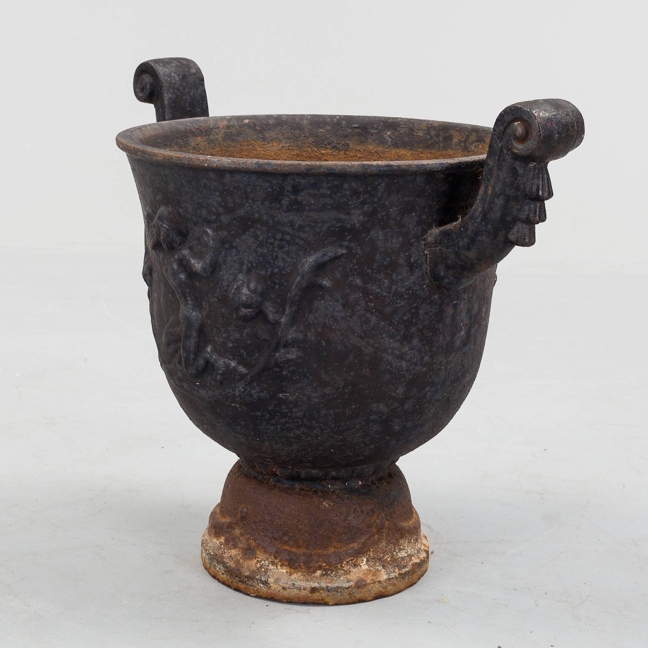 Cast iron garden urn designed by Ivar Johnsson (1885-1970) for Näfveqvarns Bruk, Sweden, circa 1930th.  3 urns available, price is for each.