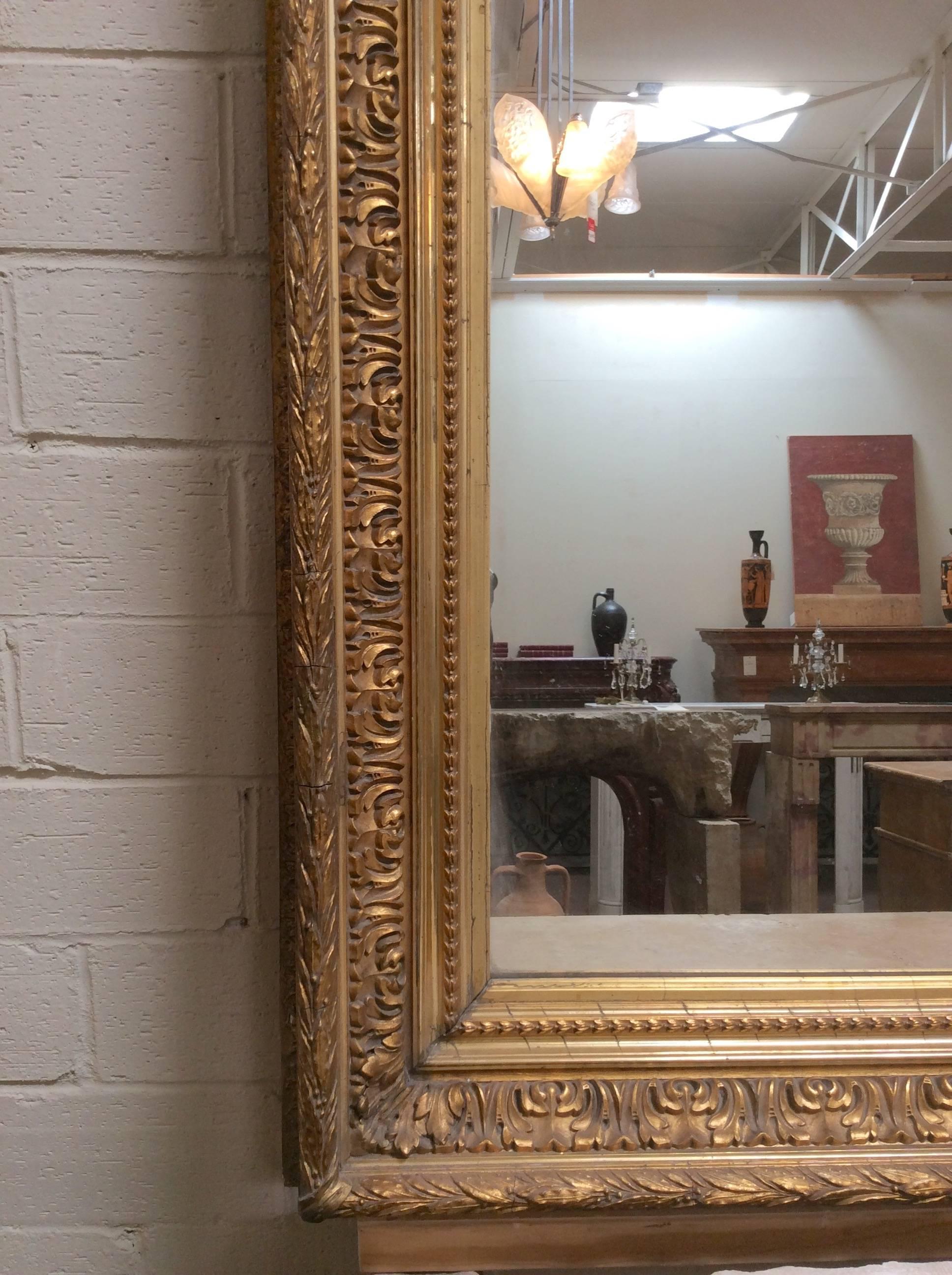 Antique gold leaf mirror.

Origin: France, 

circa 1880. 

Measurements: 52