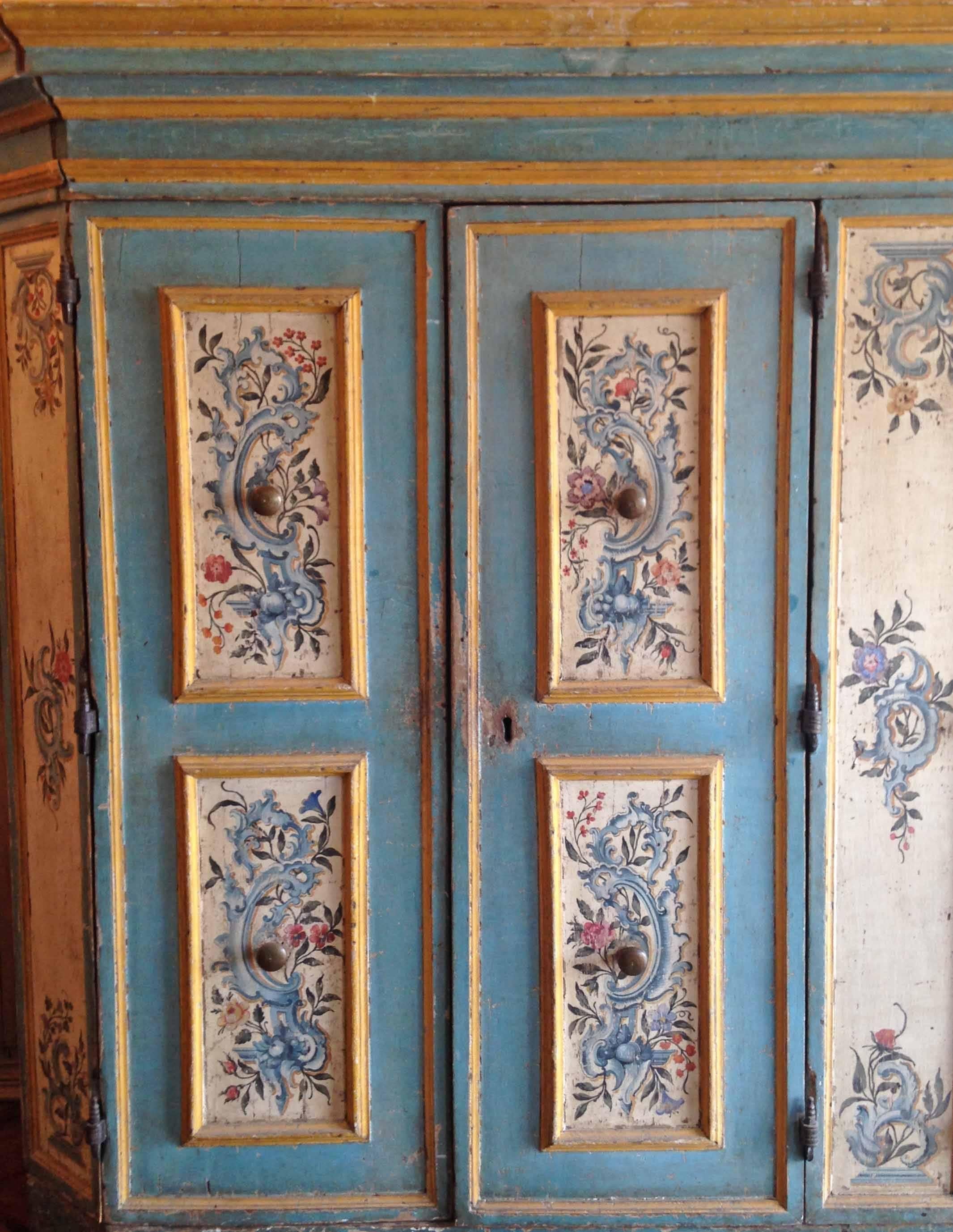 Antique Italian painted armoire features the original paint and is ideal for your living quarters. Impressive in person with great movement! 

Origin: Italy, 

circa 1750.

Measurements: 127 1/2