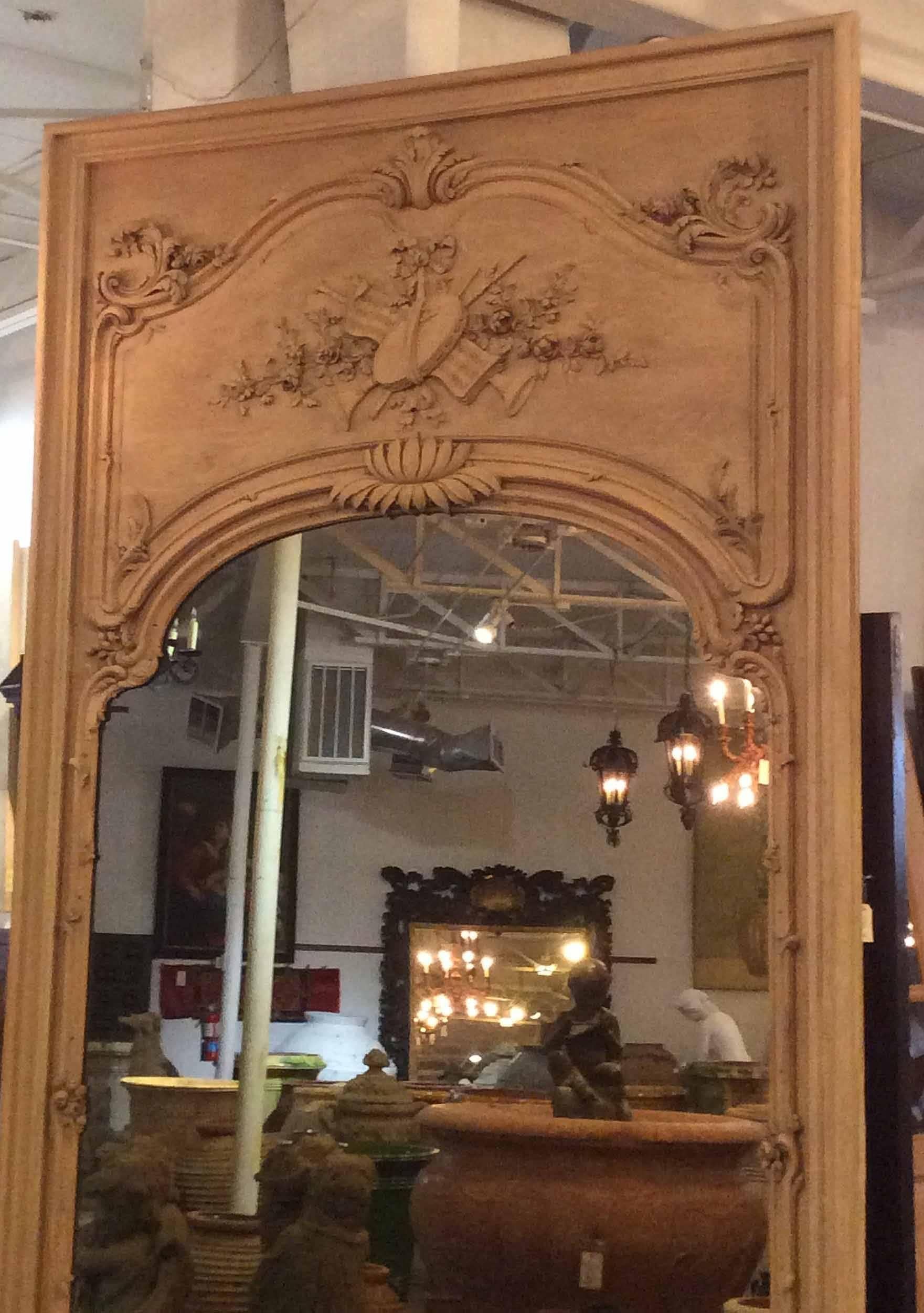 This Louis XVI style boiserie mirror is fantastic in person and makes for a great conversation piece. Masterfully hand-carved, sure to impress your guest and leave a lasting impression!

 Origin: France,

 circa 1890.

Measurements: 73