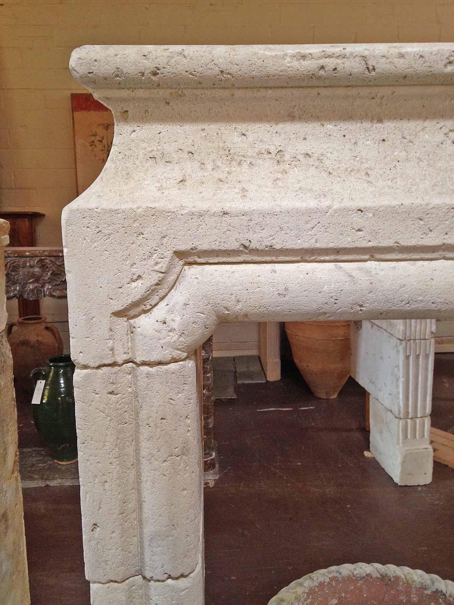 This hand-carved limestone mantel is simple, but Classic and timeless.

Origin: France.

Measurements: 65