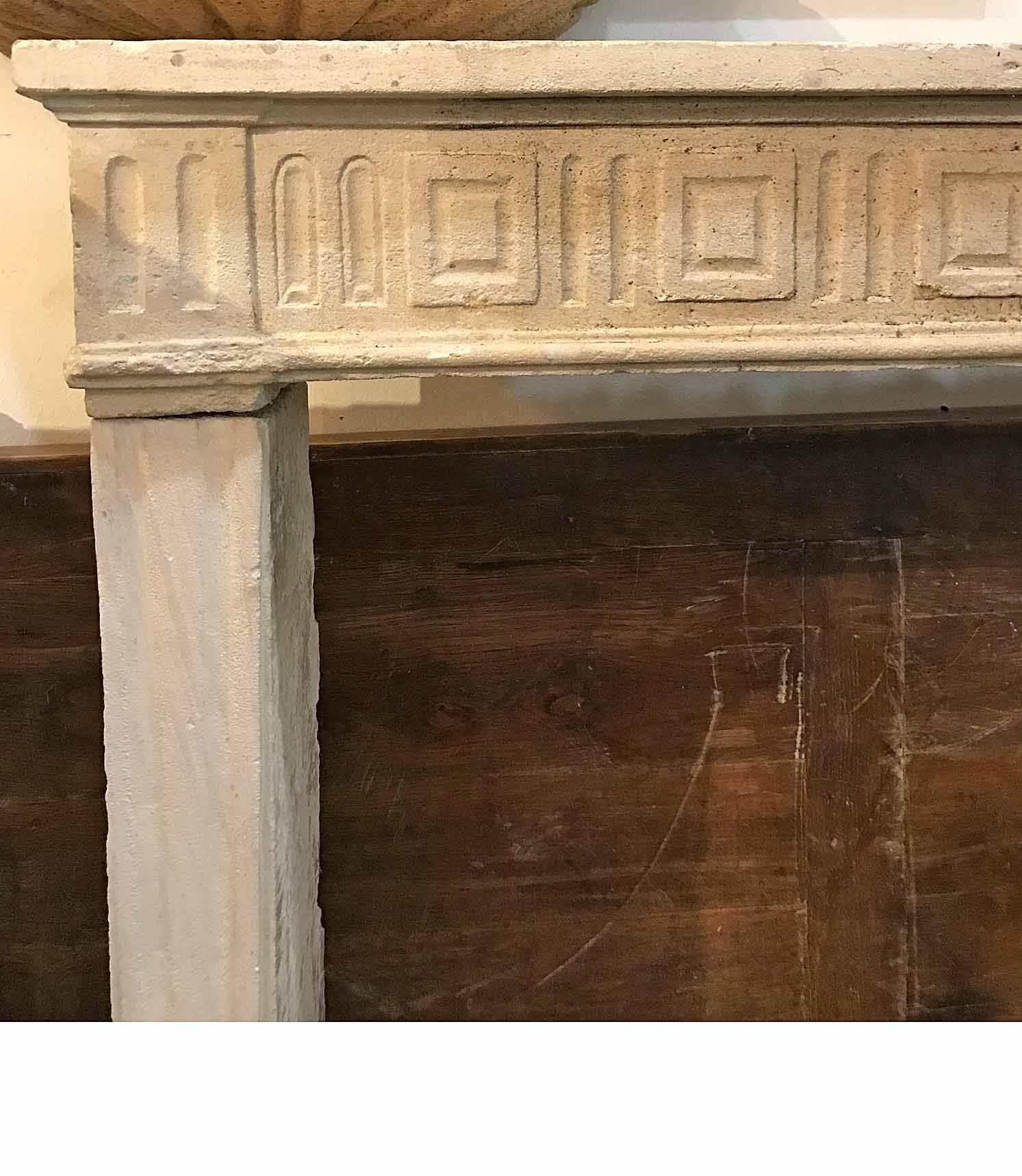 This Louis XVI antique mantel features fluted legs and a great Greek key design on lintel. A wonderful addition to your living quarters. Origin: France, circa 1750. Measurements: 65 1/2