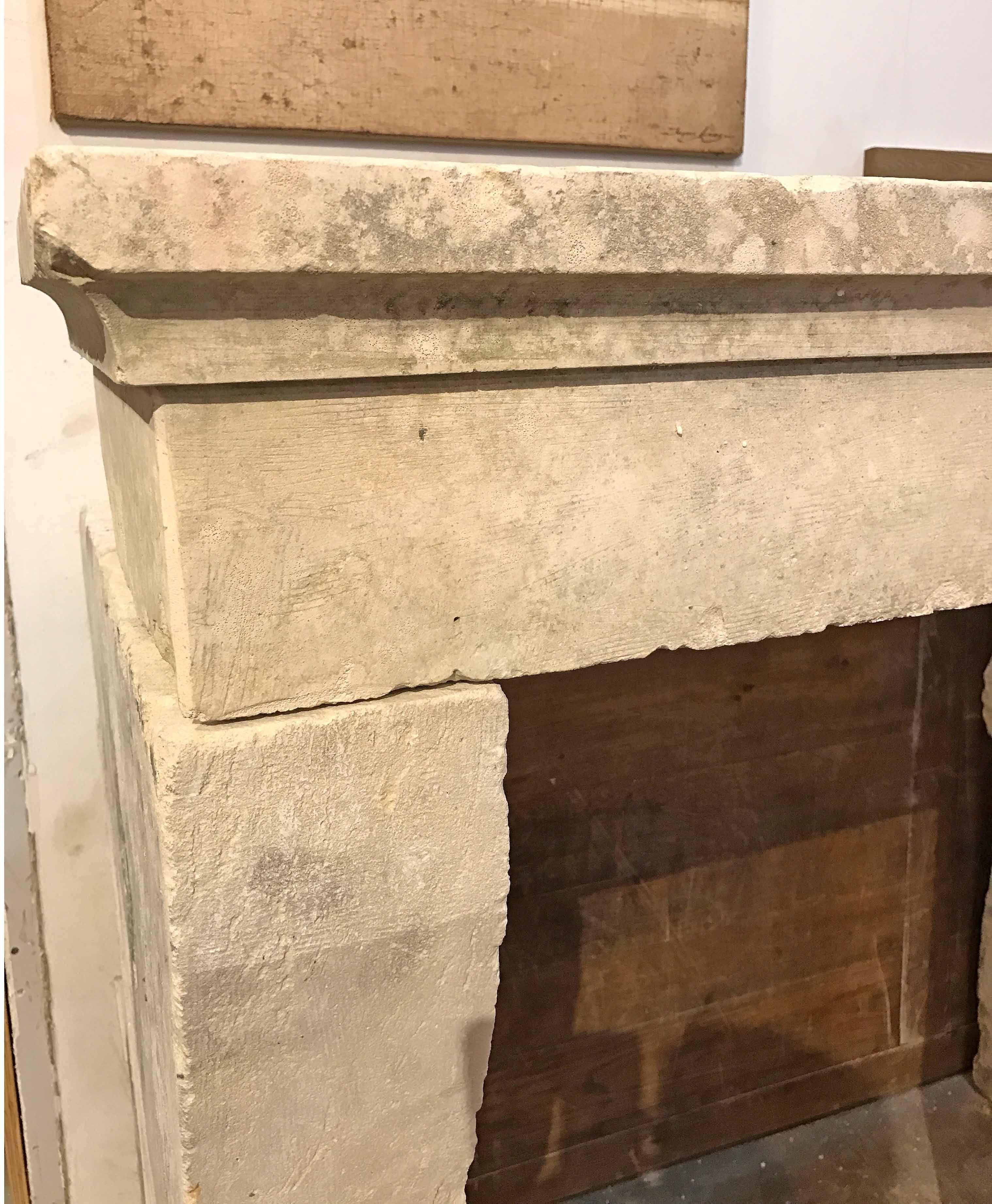 Antique limestone mantel, a great presence to any setting.

 Origin: France

 circa 1750

 Measurements: 56