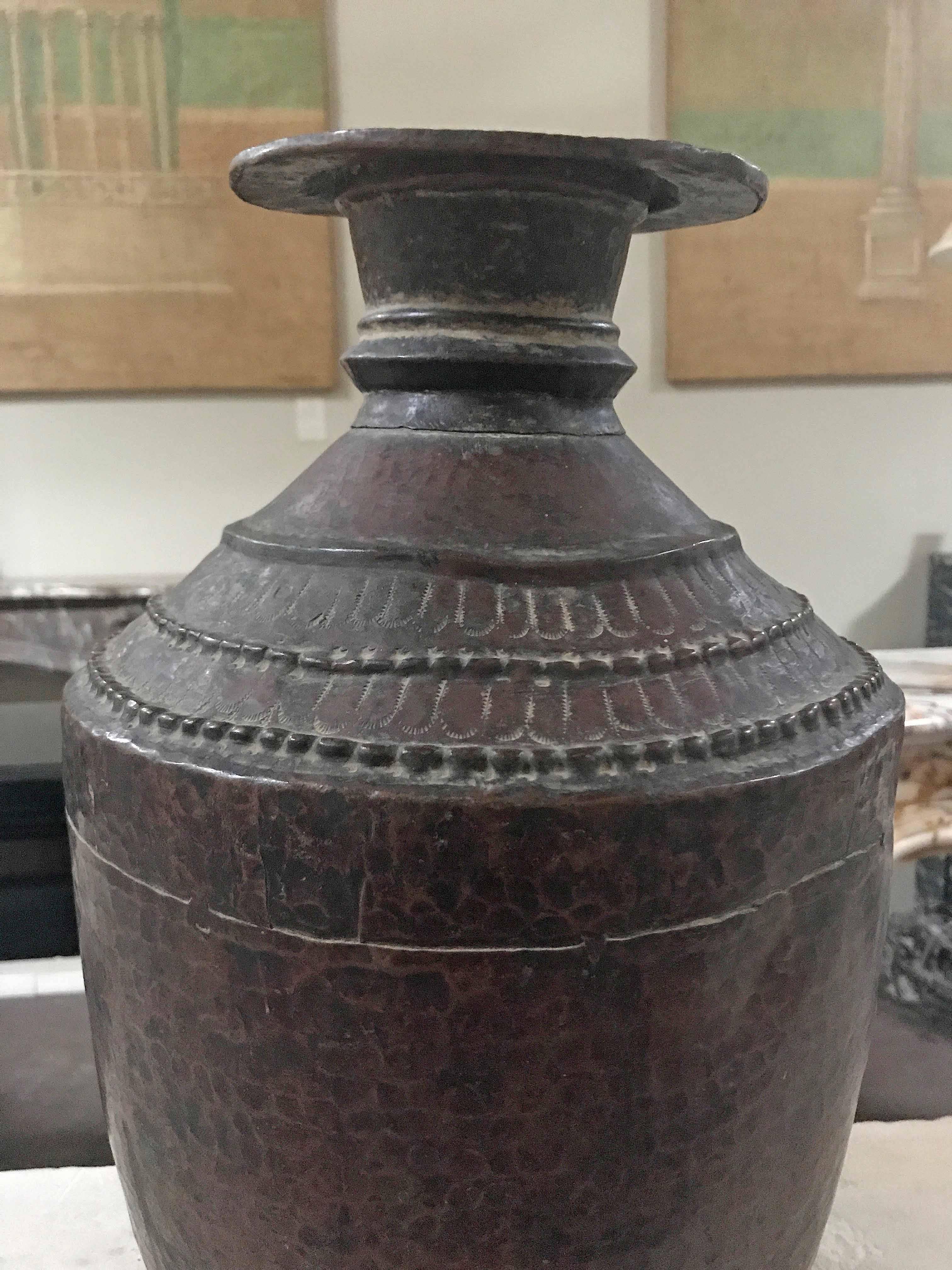 Antique water vessel

Origin: Morocco

circa 1850.

Measurements: 9