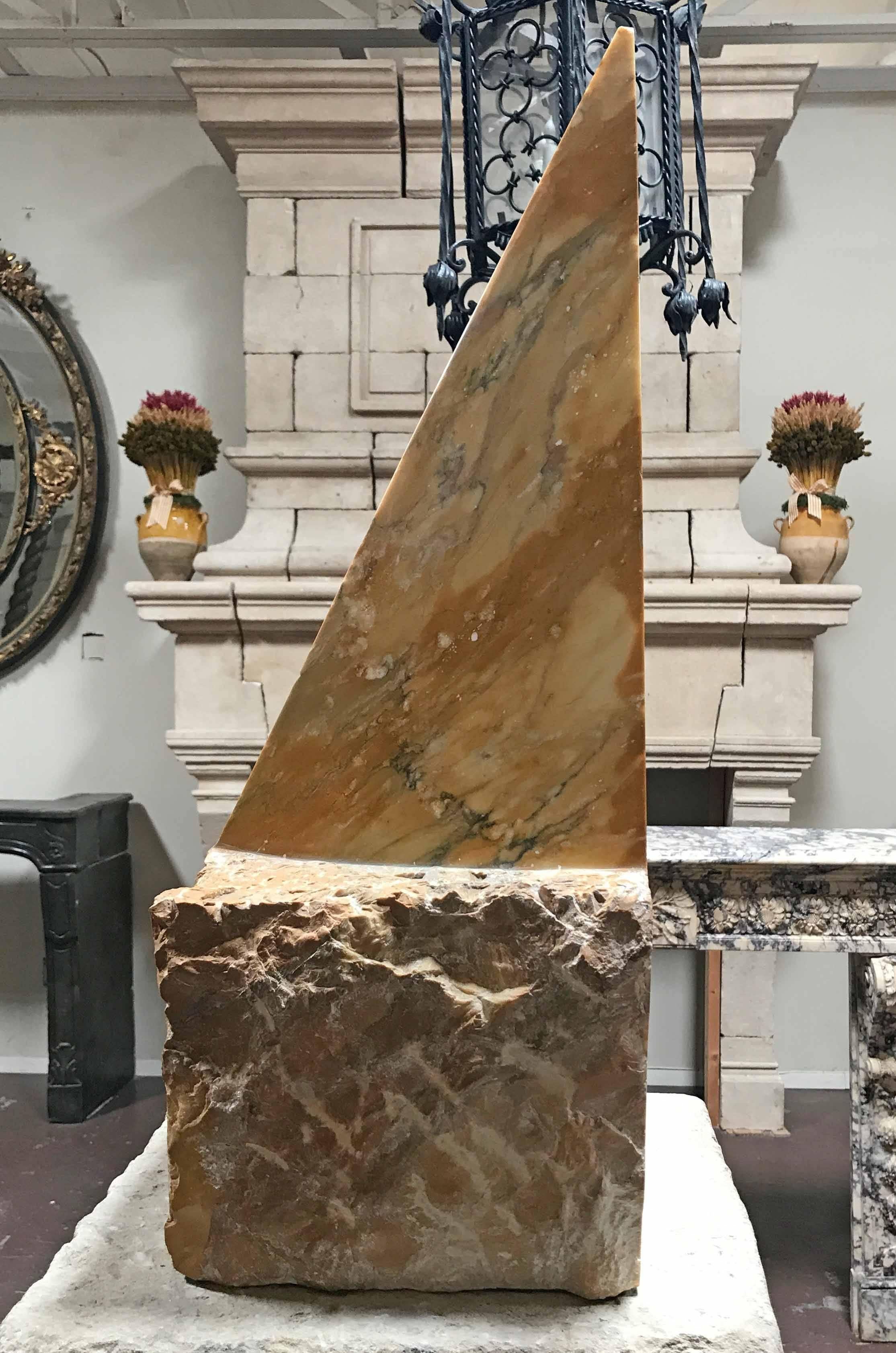 Pyramid in golden sienna marble signed with artist's monogram and dated on flat interior of one section.

Origin: Japan

circa 1979

Measurements: 28.62