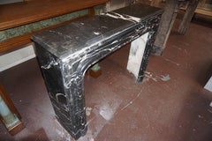 Louis XIV-Style Bolection Molded Black Saint Martin Marble Mantel