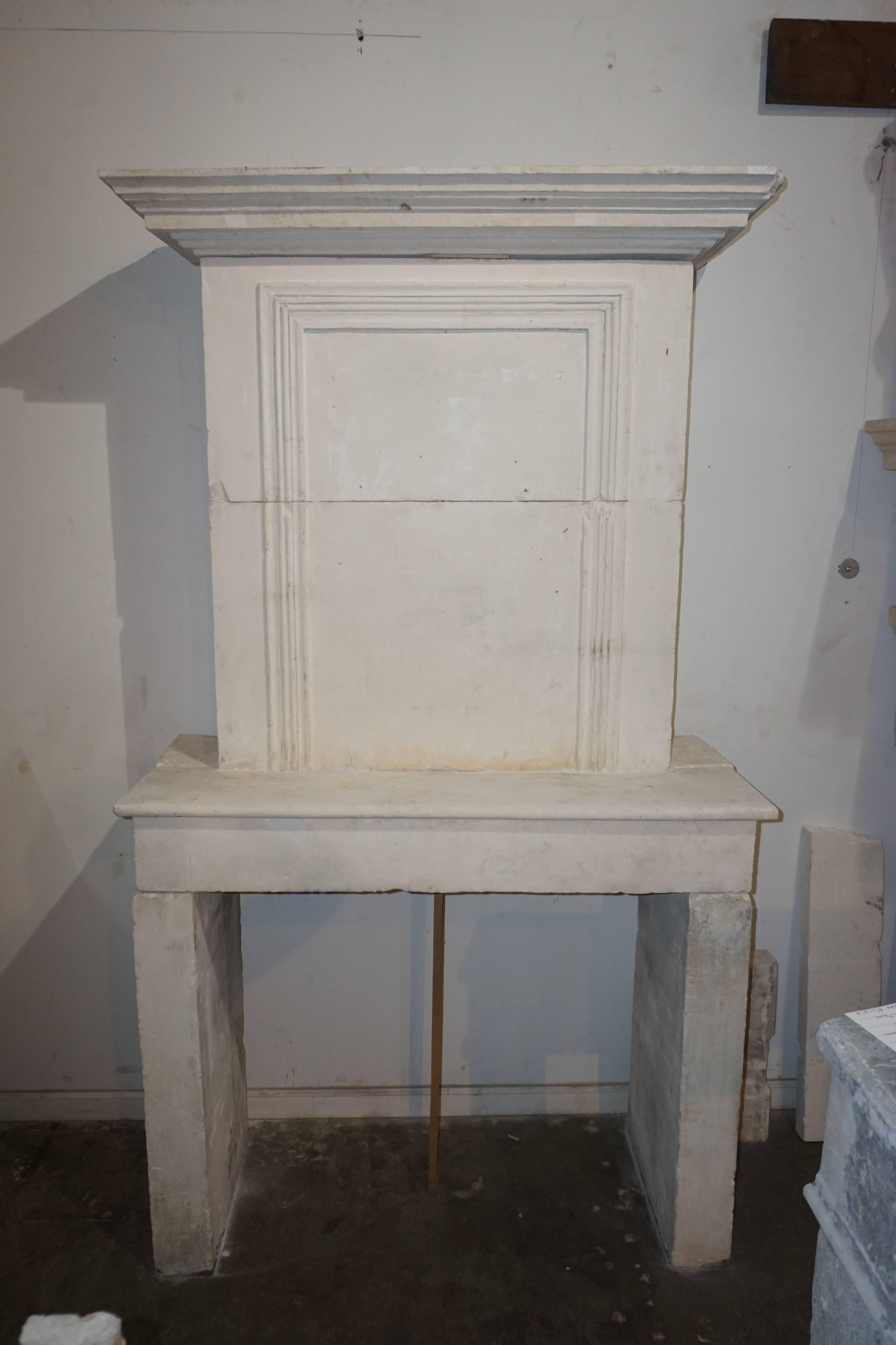 French 17th Century Louis XVI Limestone Mantel with Trumeau  For Sale