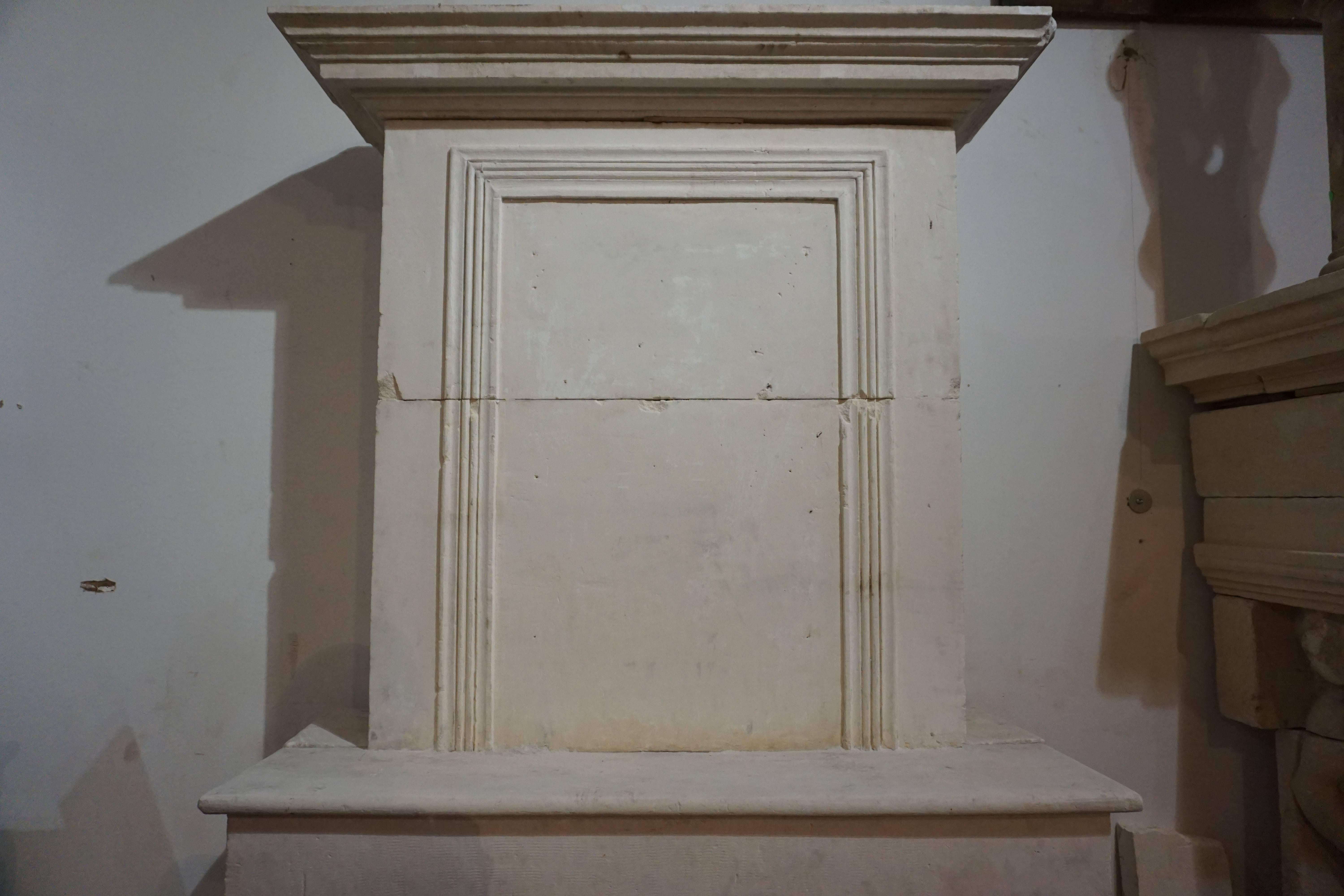 17th Century Louis XVI Limestone Mantel with Trumeau  In Excellent Condition For Sale In Dallas, TX