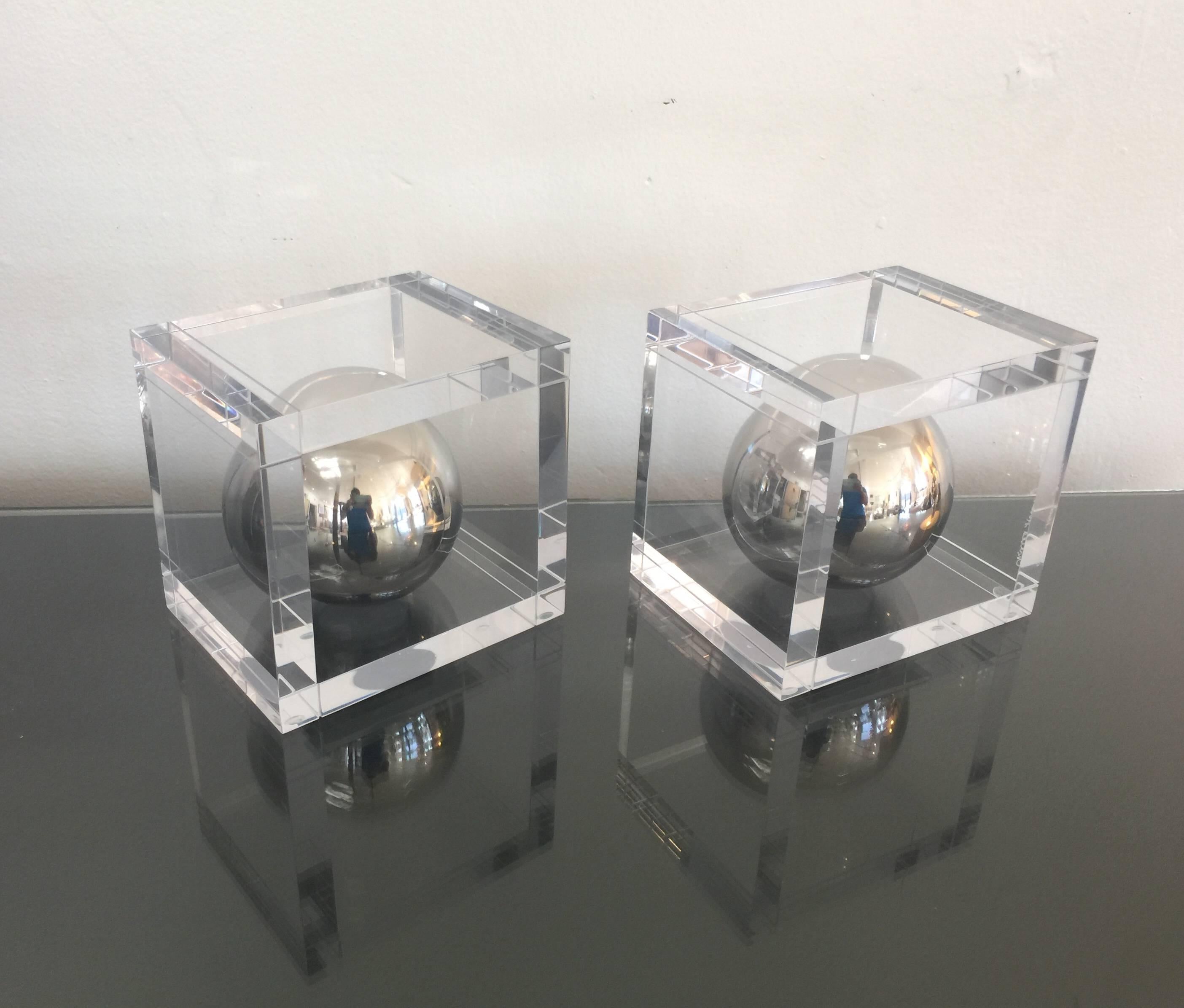 Pair of signed acrylic and aluminum bookends designed by Charles Hollis Jones. 
 Originally designed for Lucille Ball in the 1960s. 
This pair is newly made by Charles and are signed. 

Consist of 3/8