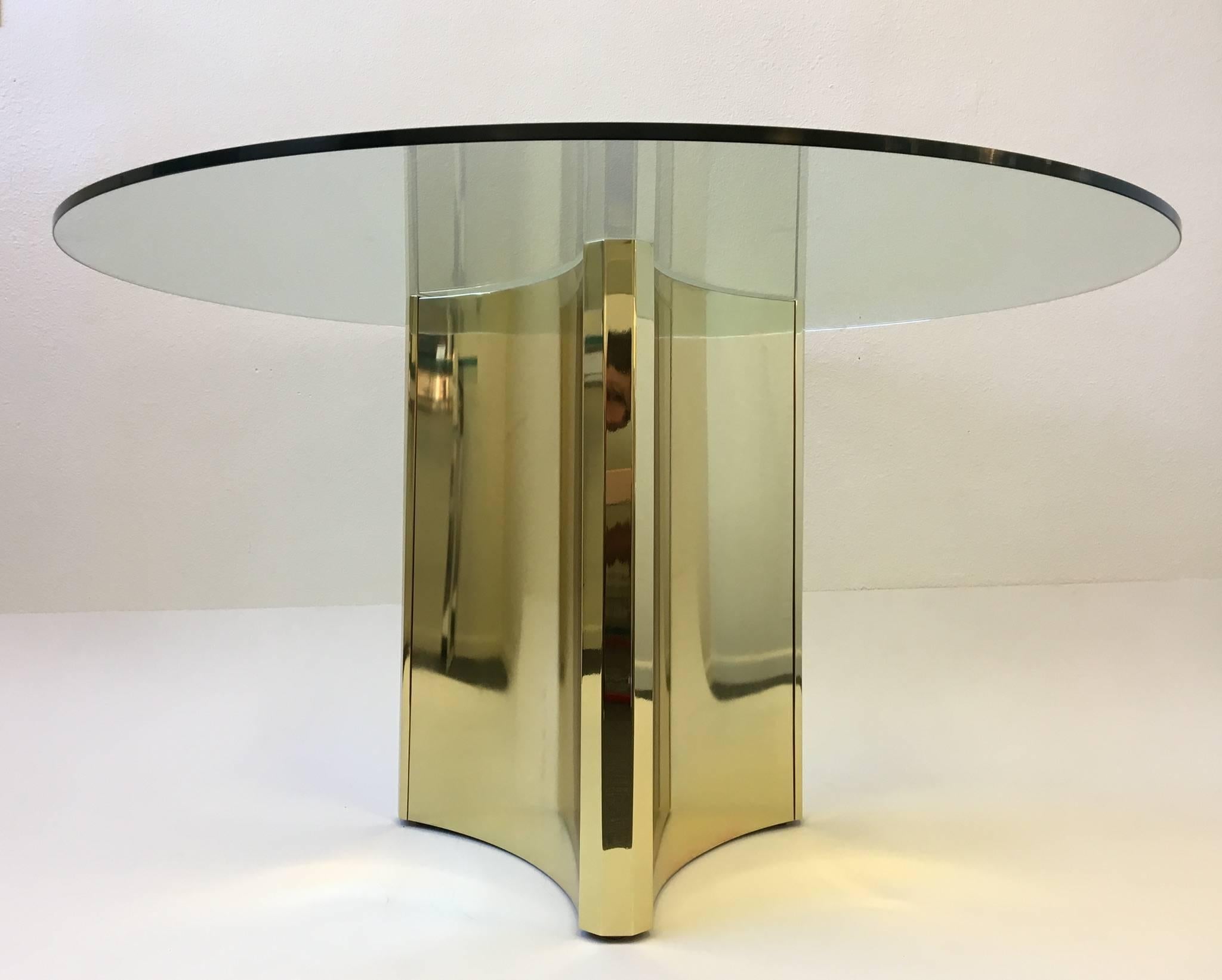 A glamorous polished brass and glass design by Mastercraft in the 1970s.
Measures: New 1/2