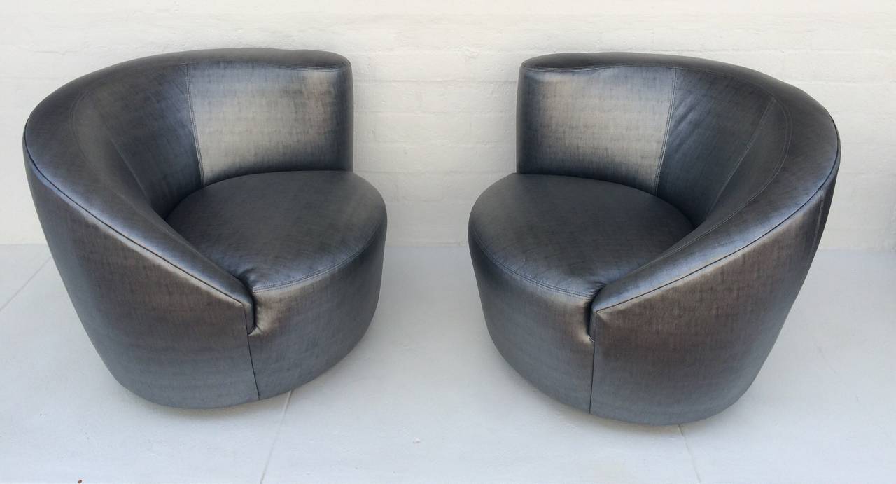 A pair of newly reupholster swivel 