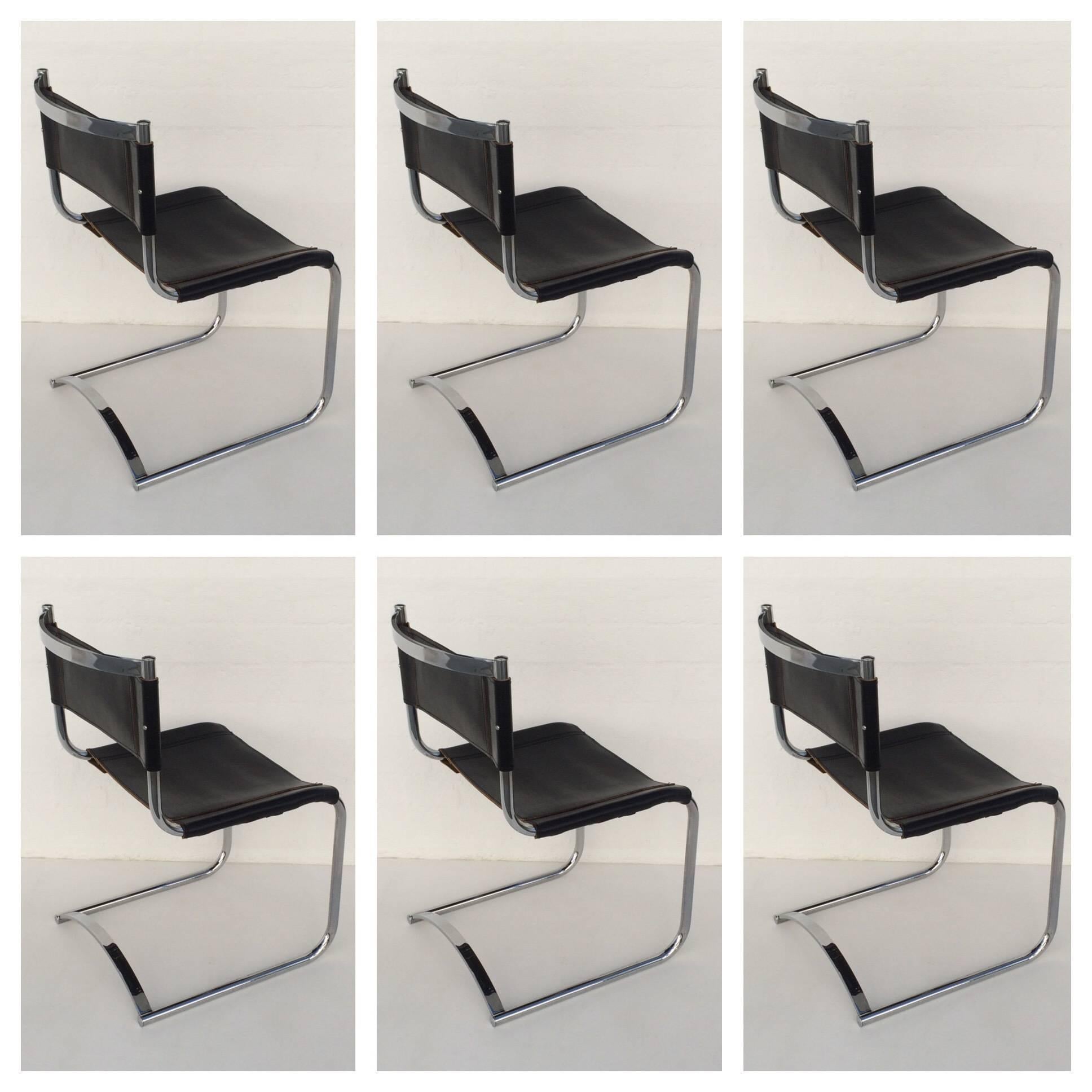 Rare set of six polished chrome and black saddle leather dining chairs attributed to CY Mann. According to the person that we purchased this from, they were originally purchased from The CY Mann Showroom in NYC in the 1970s. This are in original