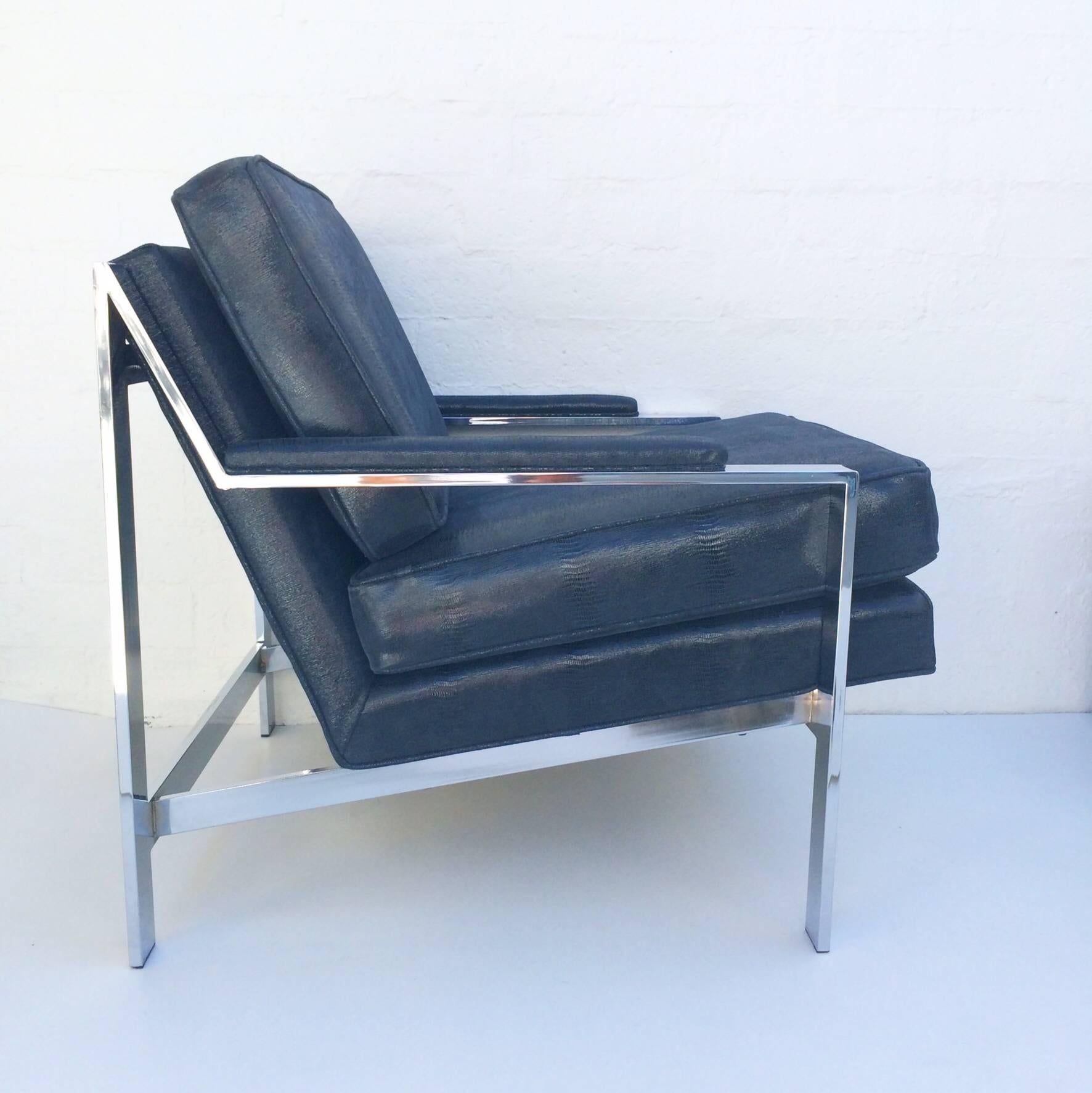 Polished Sexy Pair of Lounge Chairs Designed by Cy Mann