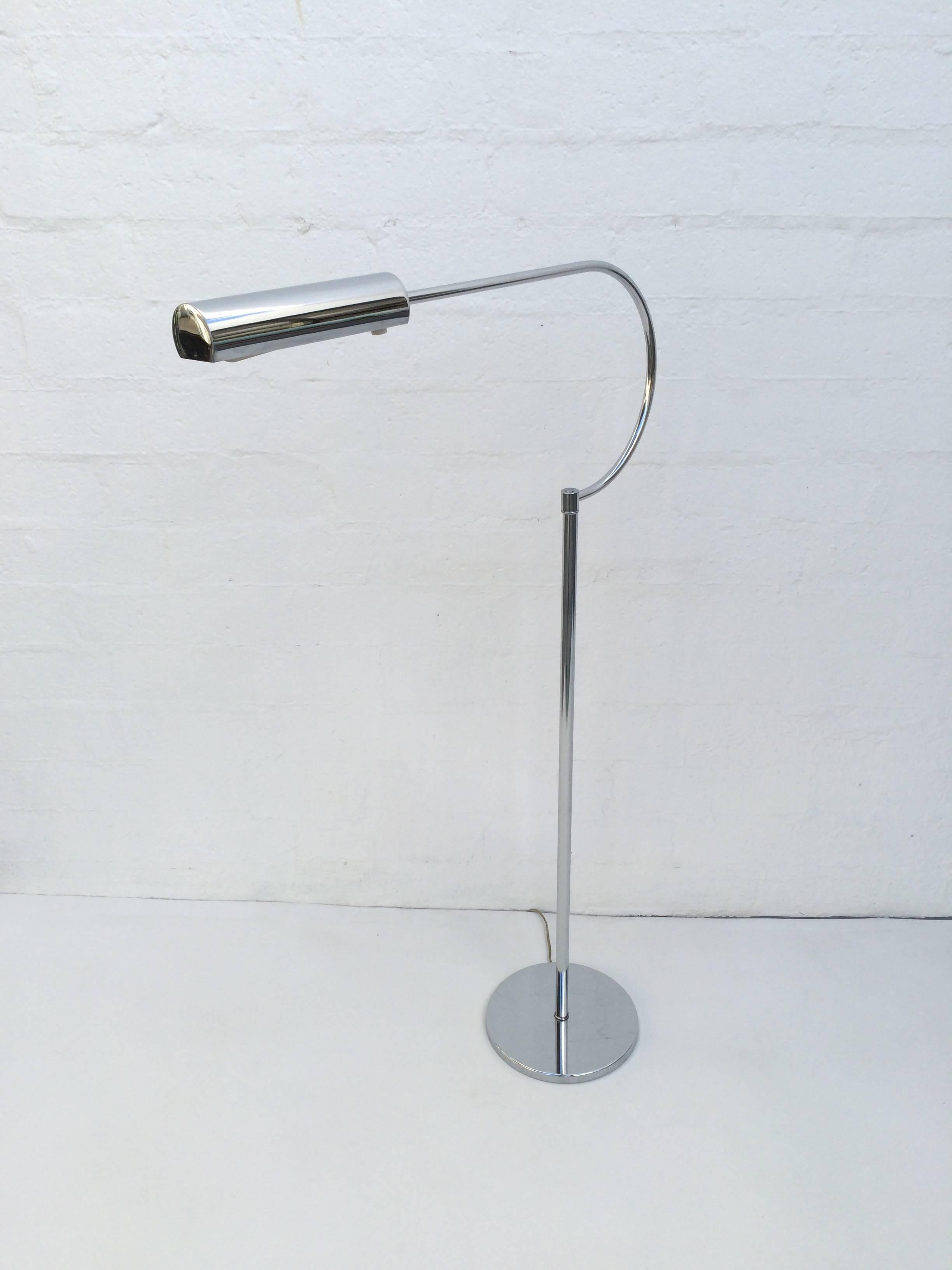 Stunning Italian polished floor lamp made by Raymor. 
These rare lamps don't come up for sale very often. 
Newly rewired. 
Unique in its design, this lamp can add drama to a sitting area or office.