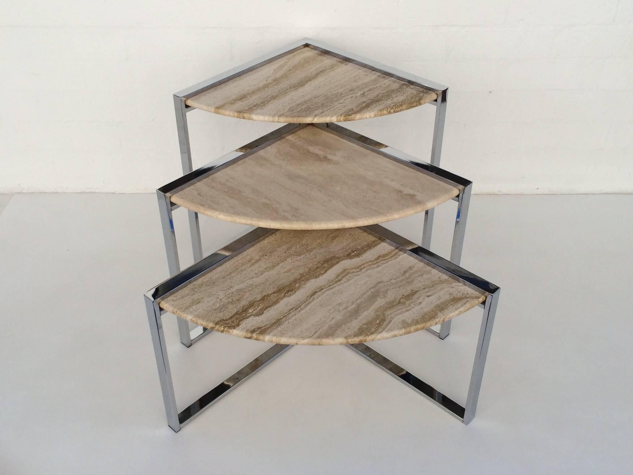 Three triangular nesting tables designed by Milo Baughman for Design Institute of America.
These tables consist of Italian travertine triangular tops and polished chrome bases.
Retain the DIA label.
Measures: 22