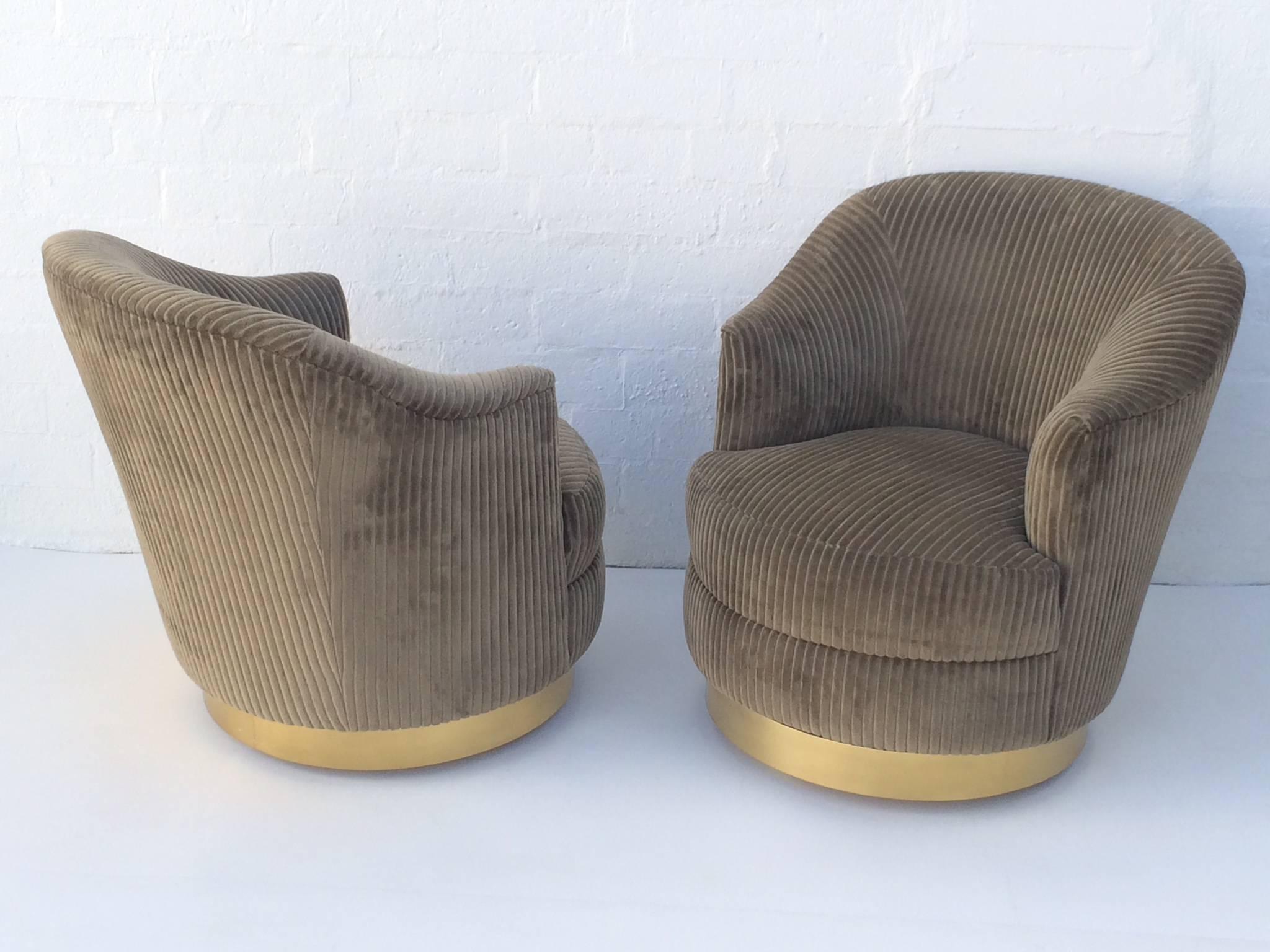 American Pair of Brass Swivel Club Chairs by Karl Springer