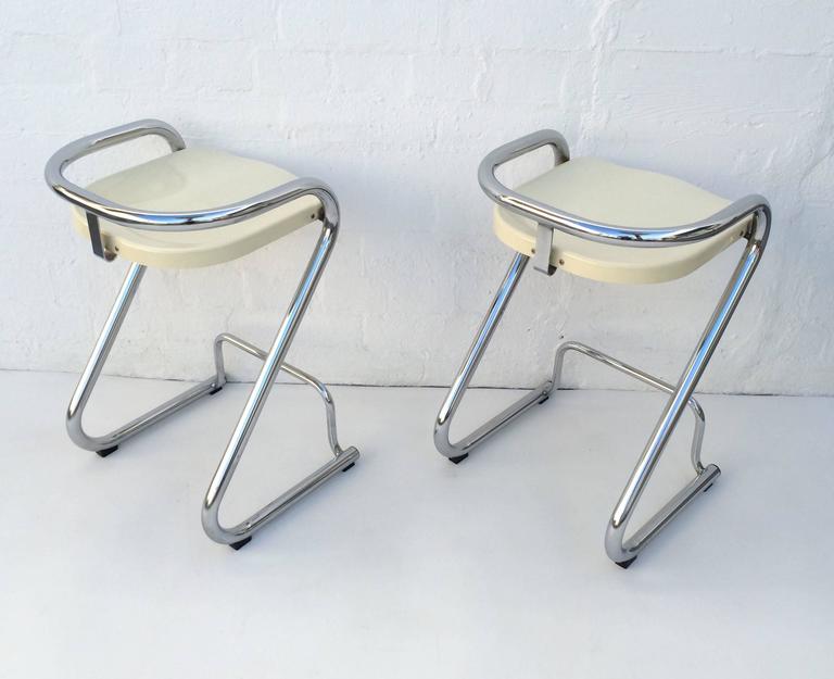 1960s Sculpted Z barstools design by Börger Lindau & Bo Lindekrantz for Lammhultspolished. They are polished chrome with of white molded plastic seats.