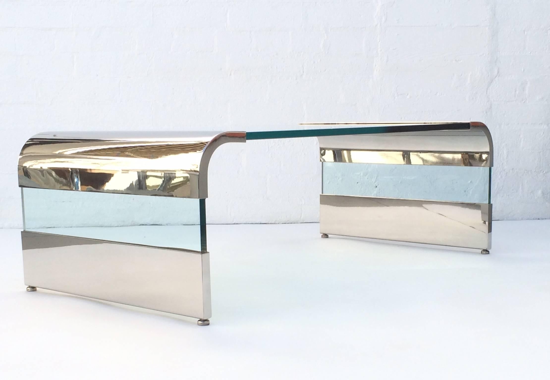 A 1970s polished stainless steel and 3/4