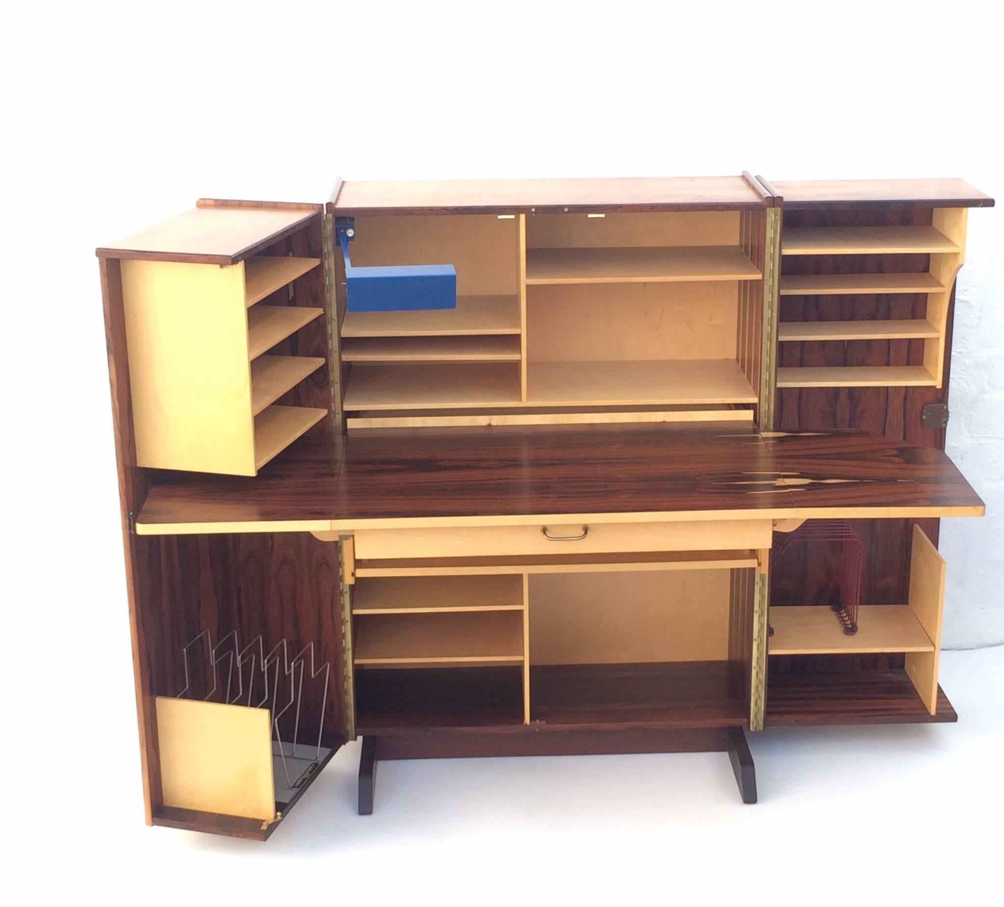 Rare 1960s, Norwegian rosewood fold-up desk.
This amazing desk folds up into a compact box!
Great for a studio space or small room.
When closed it measures 45