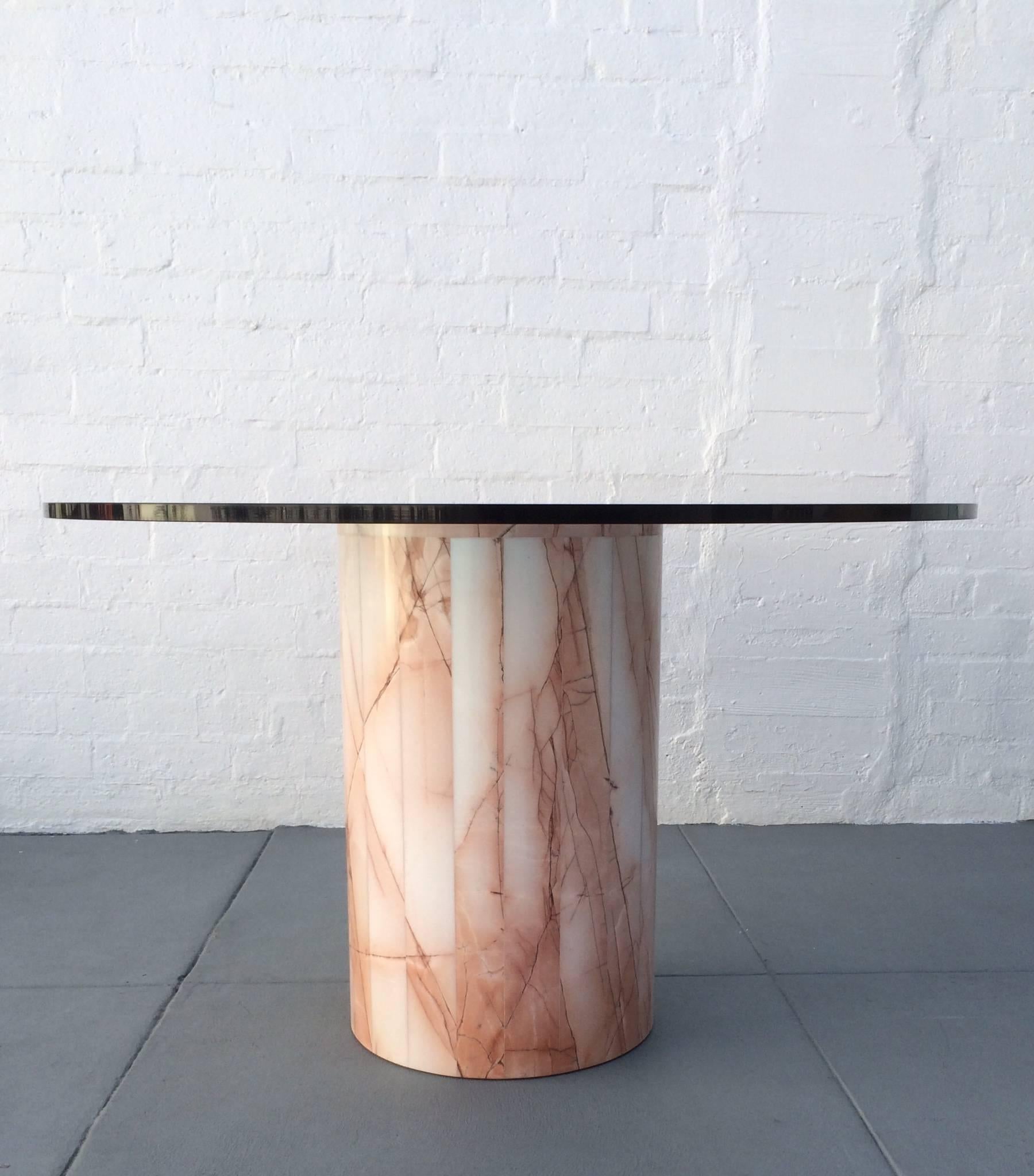 Stunning multicolor Italian marble table base with a round 48 inch diameter 3/4 inch thick glass top.
This beautiful marble base has tones of pink with white and hints of gray.
Can also be used alone as a pedestal.