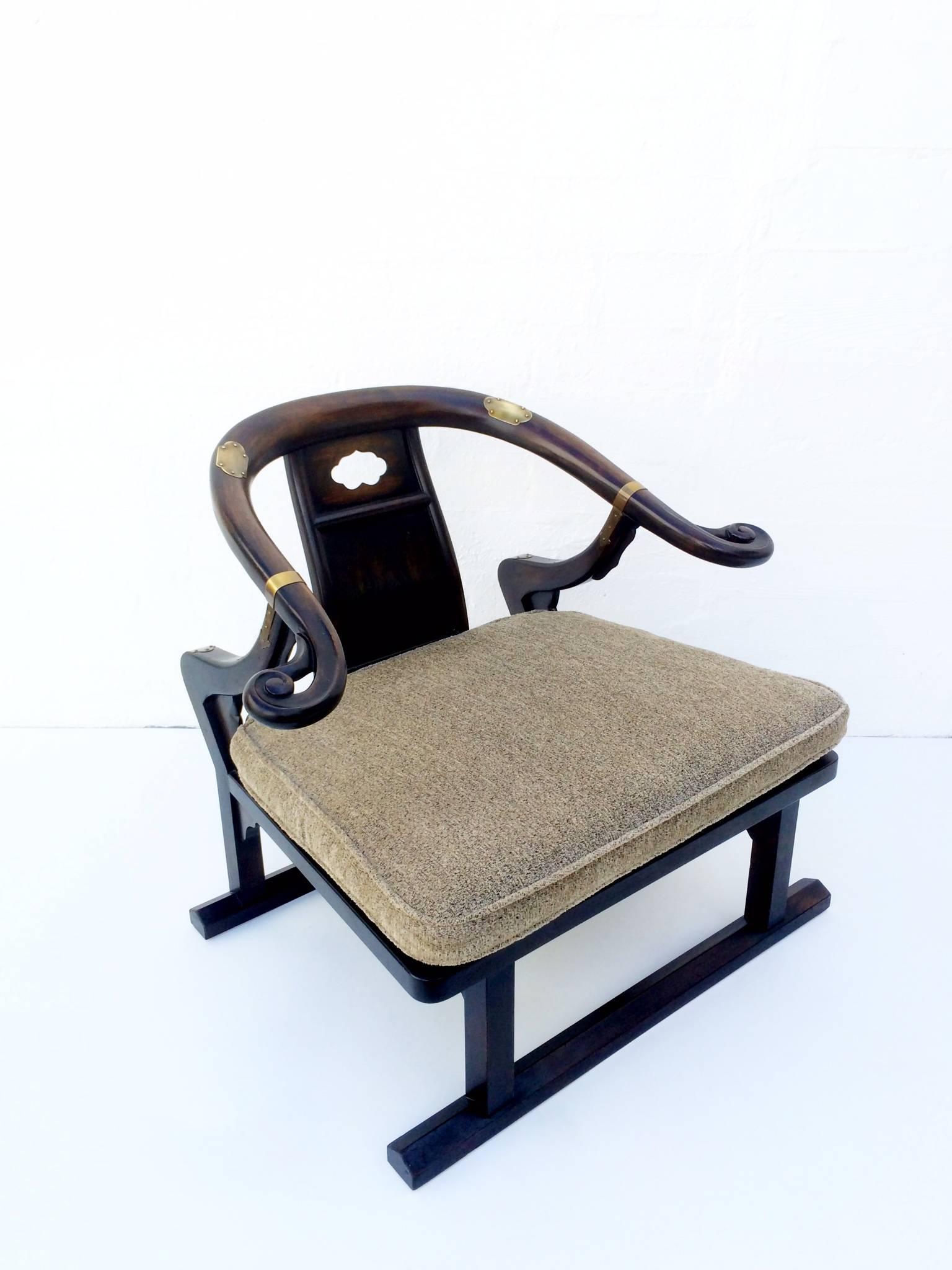 1950s dark walnut lounge chair  by Bakers furniture company's Far East collection.