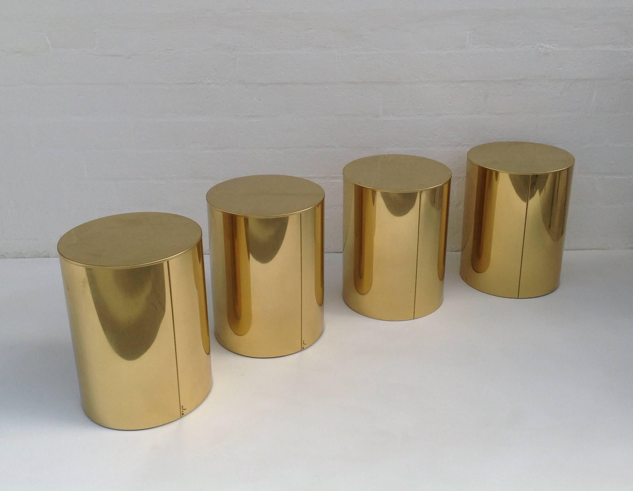 1970s polished brass side tables by C Jere'. This can be used all together to make a large cocktail table or just as a single side table. They are all signed C Jere'.