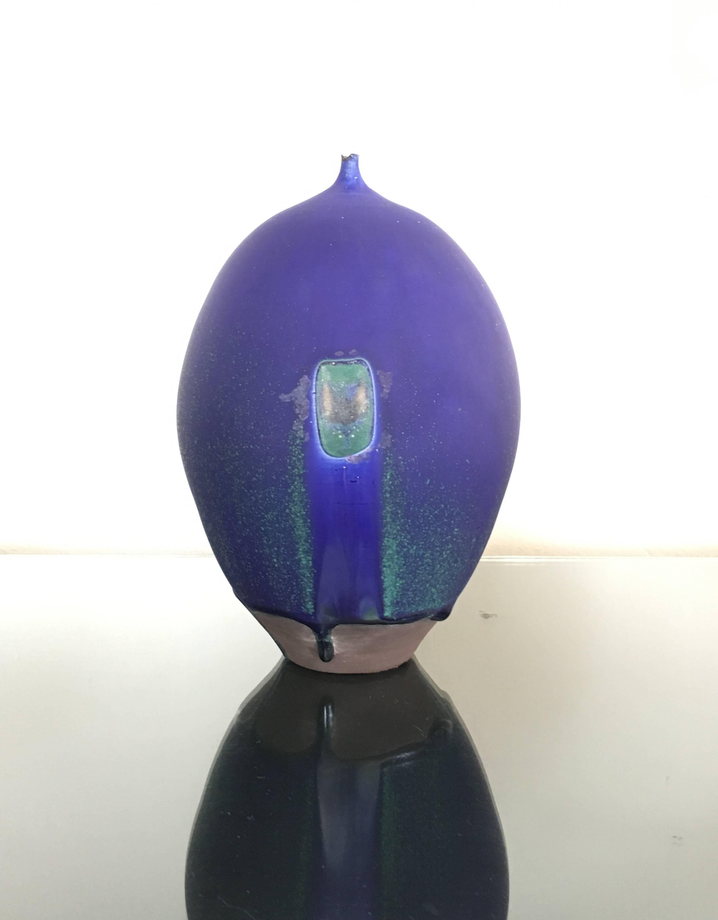 An amazing collection of seven "Feelie" vases by Rose Cabat 1936-1986. This all have beautiful vibrant colors. All of them are marked Cabat with the exception of one but we can get paperwork from the Cabats daughter. These were all