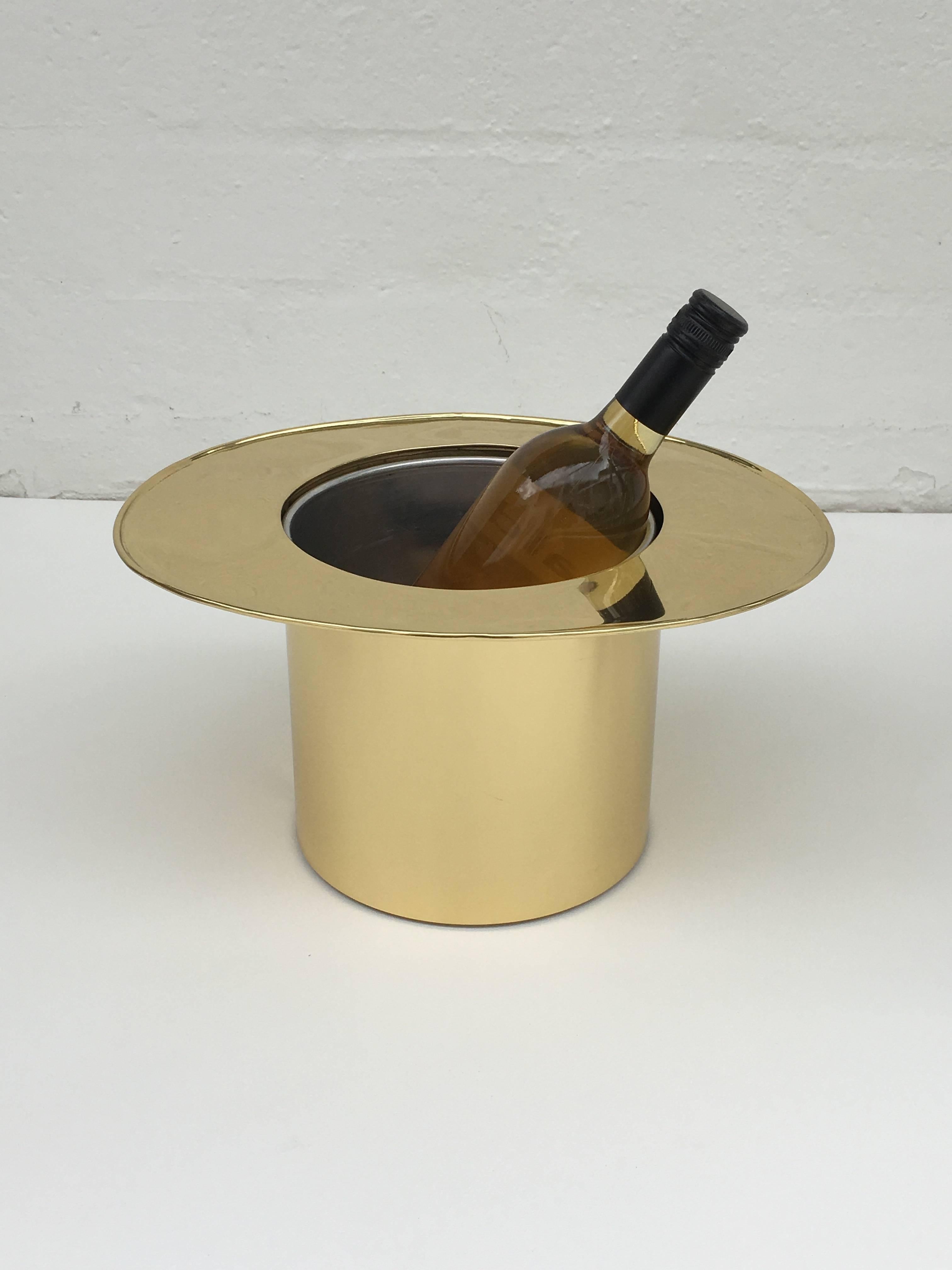 A cool polished brass Italian ice bucket with an aluminum insert from the 1970s.
Newly replated.