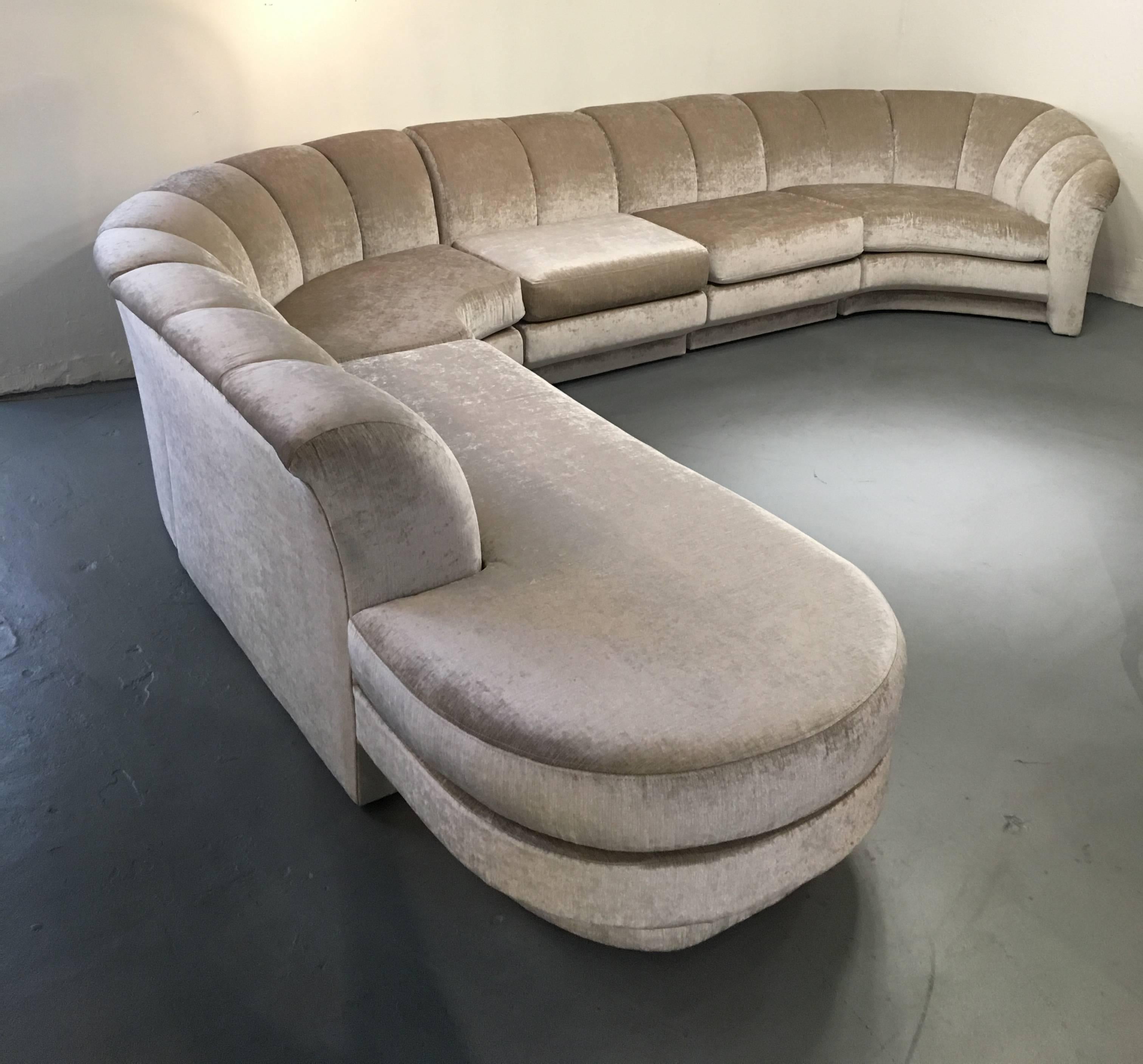 A glamorous Chanel back five-piece sectional sofa design by Milo Baughman for Thayer Coggin in the 1980s.

Newly recovered in a soft cream color chenille fabric.
Two of the sections can be moved to either side, to make one side shorter or longer.