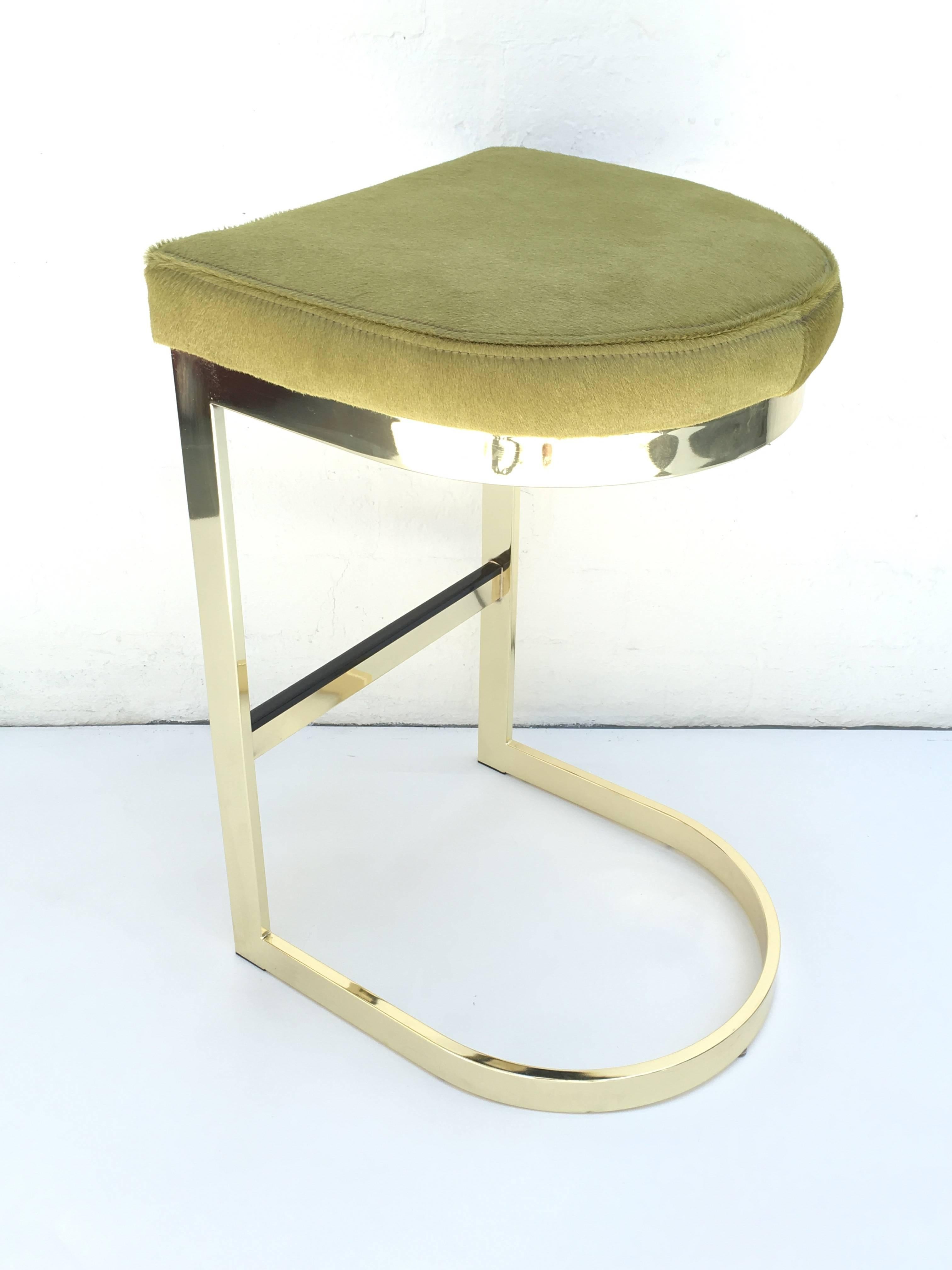 Late 20th Century Set of Three Polished Brass and Pony Hide Barstools by Milo Baughman 