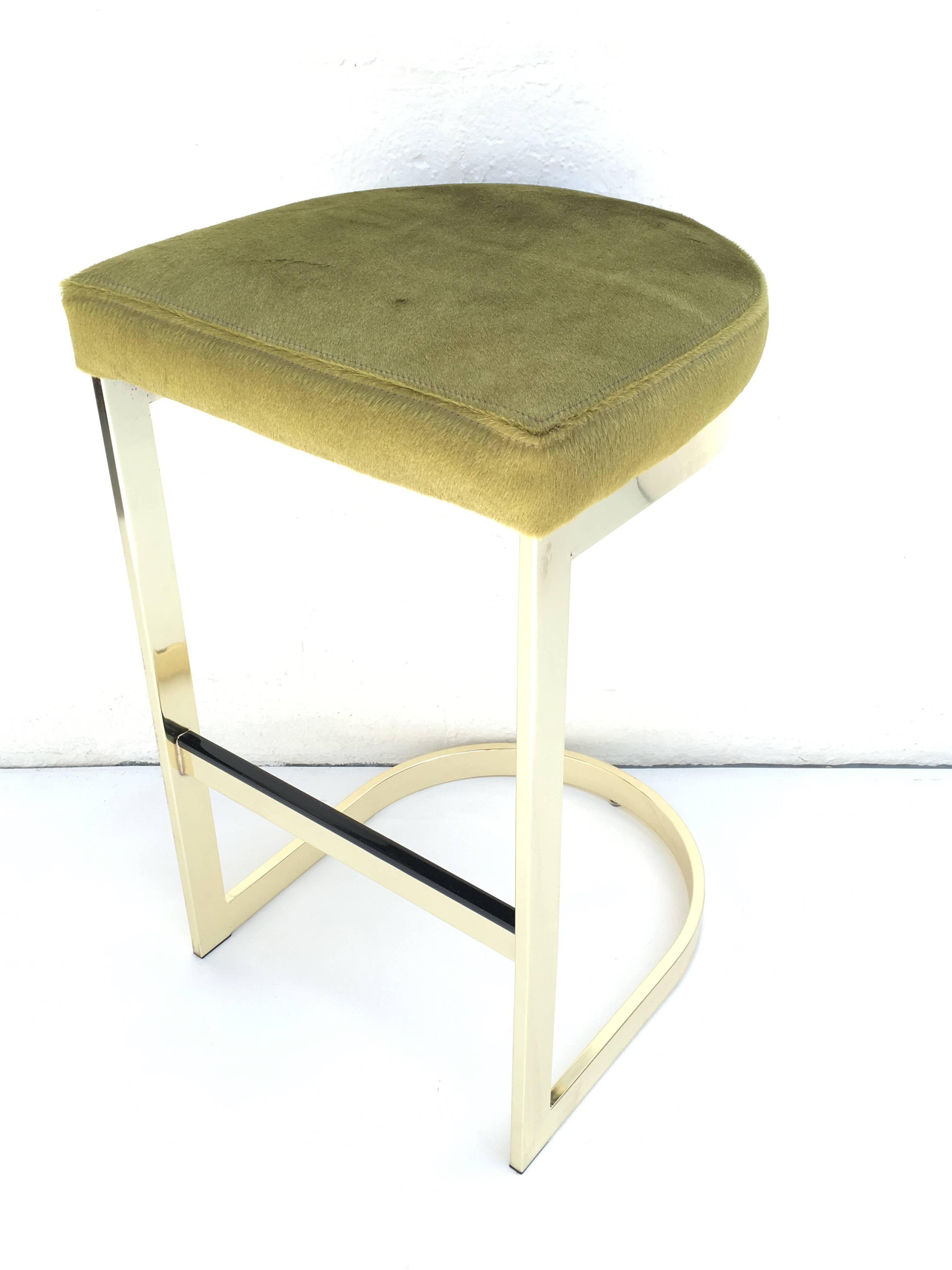 Set of Three Polished Brass and Pony Hide Barstools by Milo Baughman  1