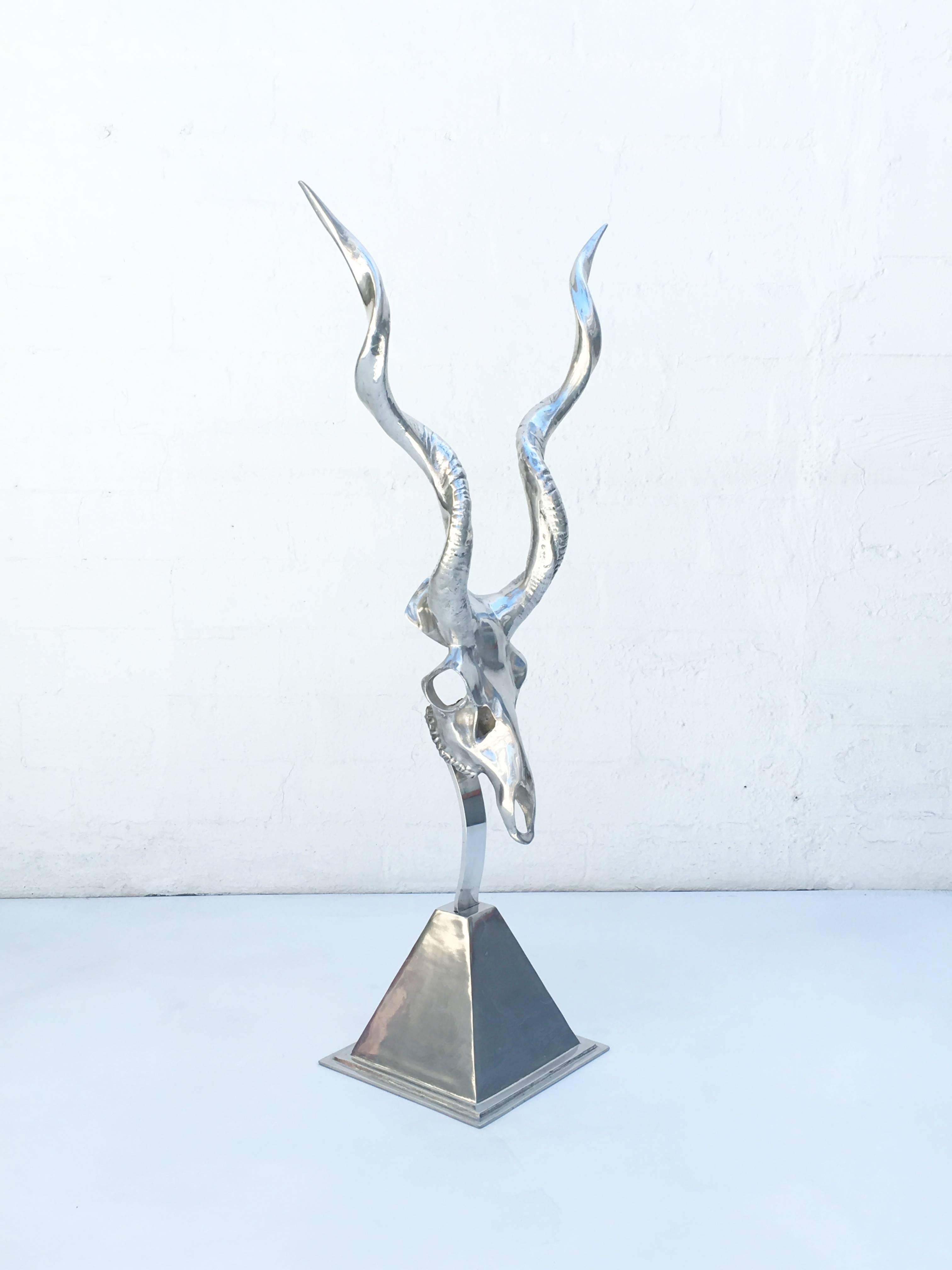 A cast aluminum and then polished African Kudu sculpture. Design by Arthur Court in the 1970s.