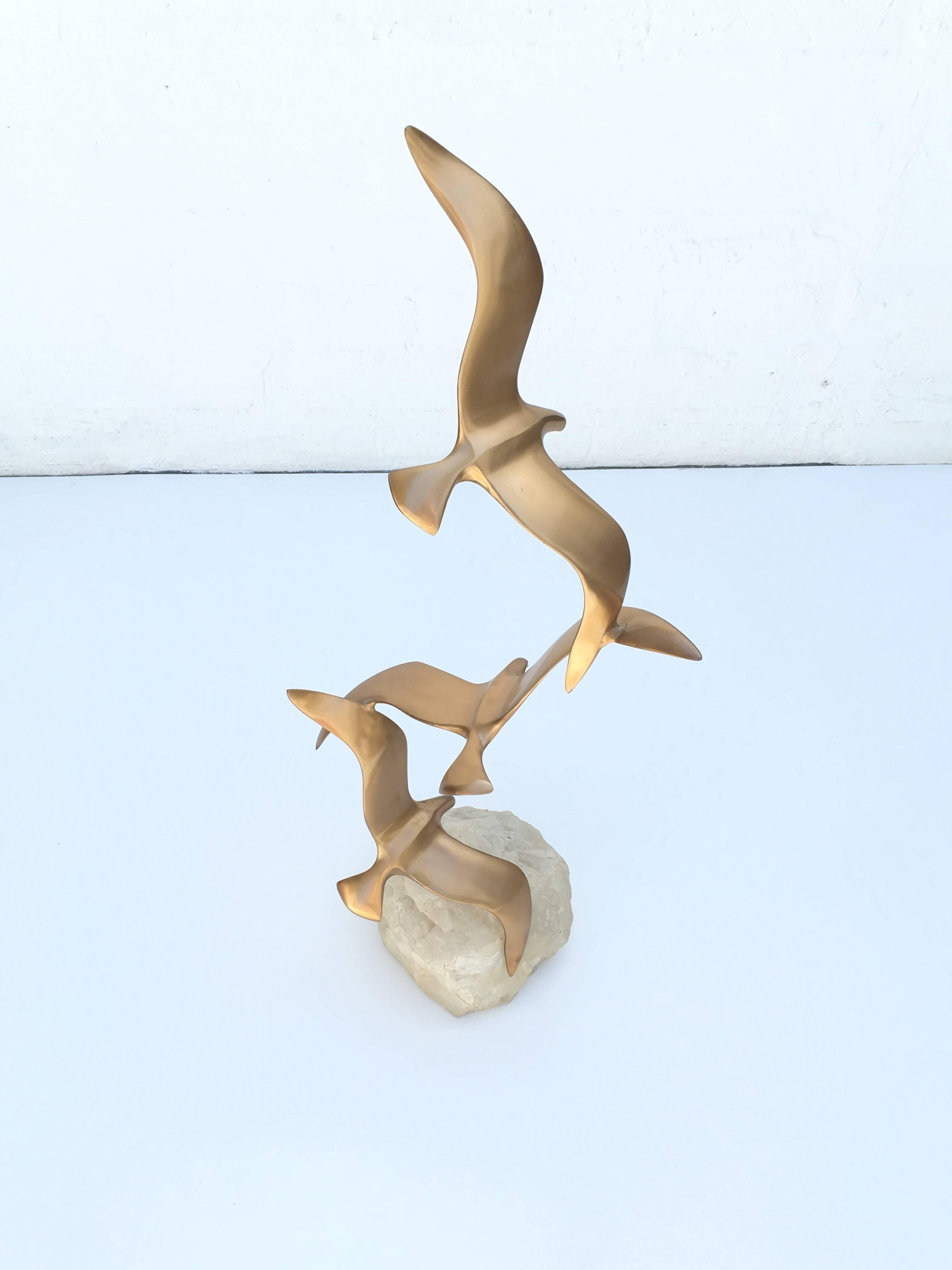 A 1970s brass and onyx sculpture signed by Curtis Jere.
The base and the birds do come apart.