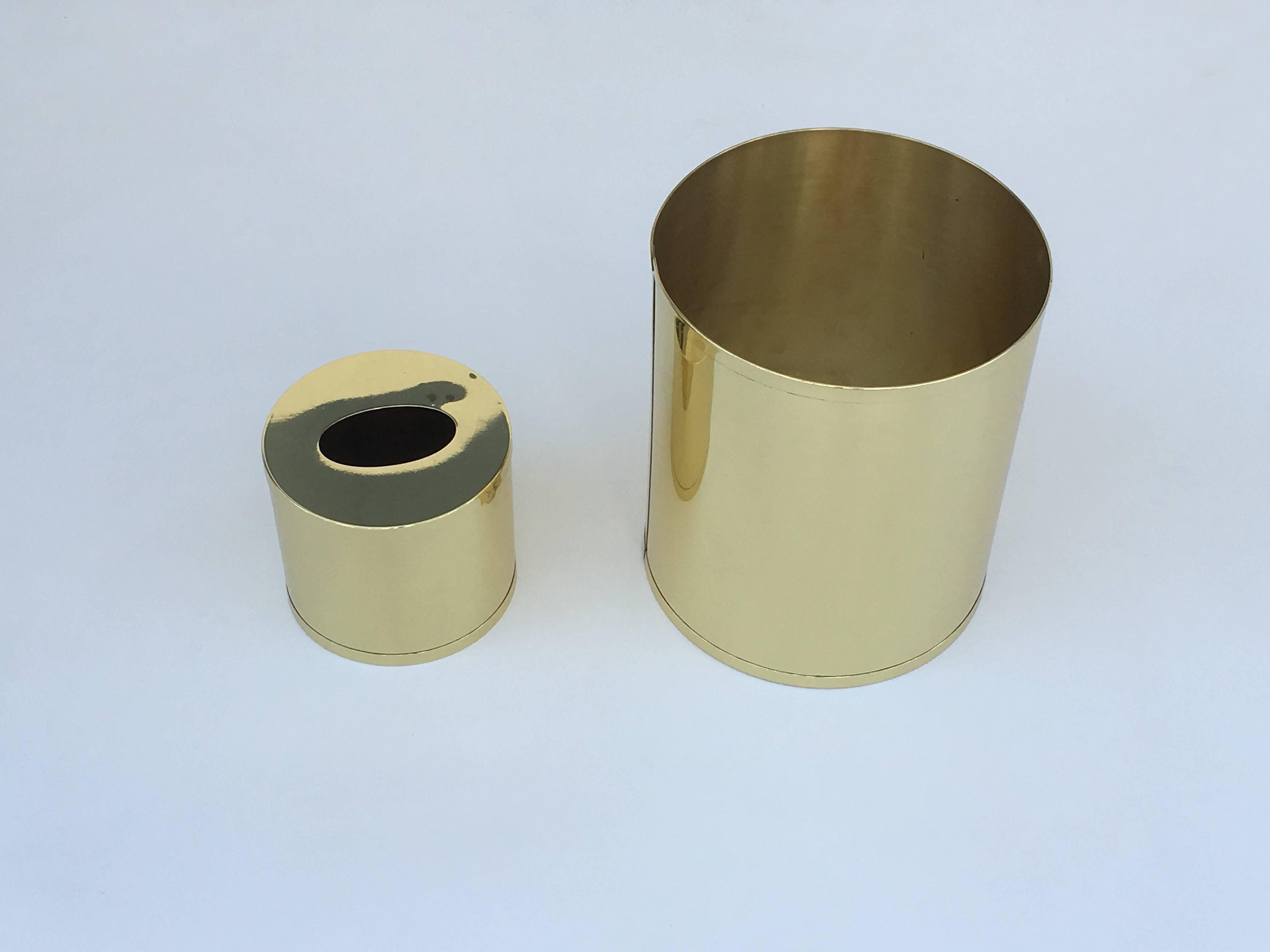 A glamorous set of polished brass waste basket and tissue box holder designed by Charles Hollis Jones in the 1970s. This were special order by clients. 

The waste basket is 11