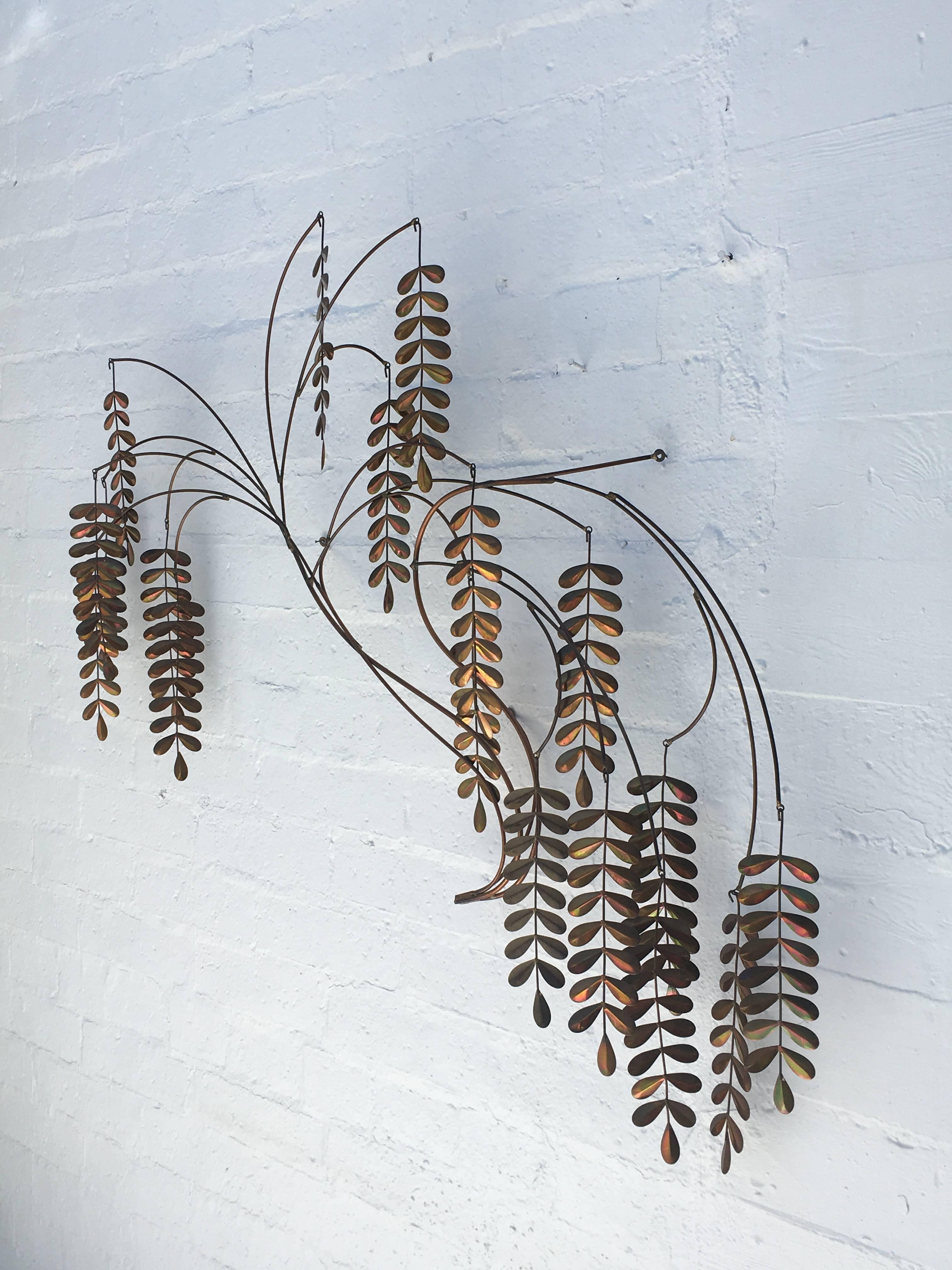A brass Kinetic wall sculpture of a tree branch by Curtis Jere.
All the leaves are removable.
Signed and dated.