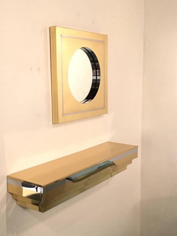 A rare 1985 brass and chrome wall-mounted console and mirror by Curtis Jere'
The console is signed and dated in the back see photos.
They are in good condition they have some minor wear and use.
If you need more photos please contact us.
 