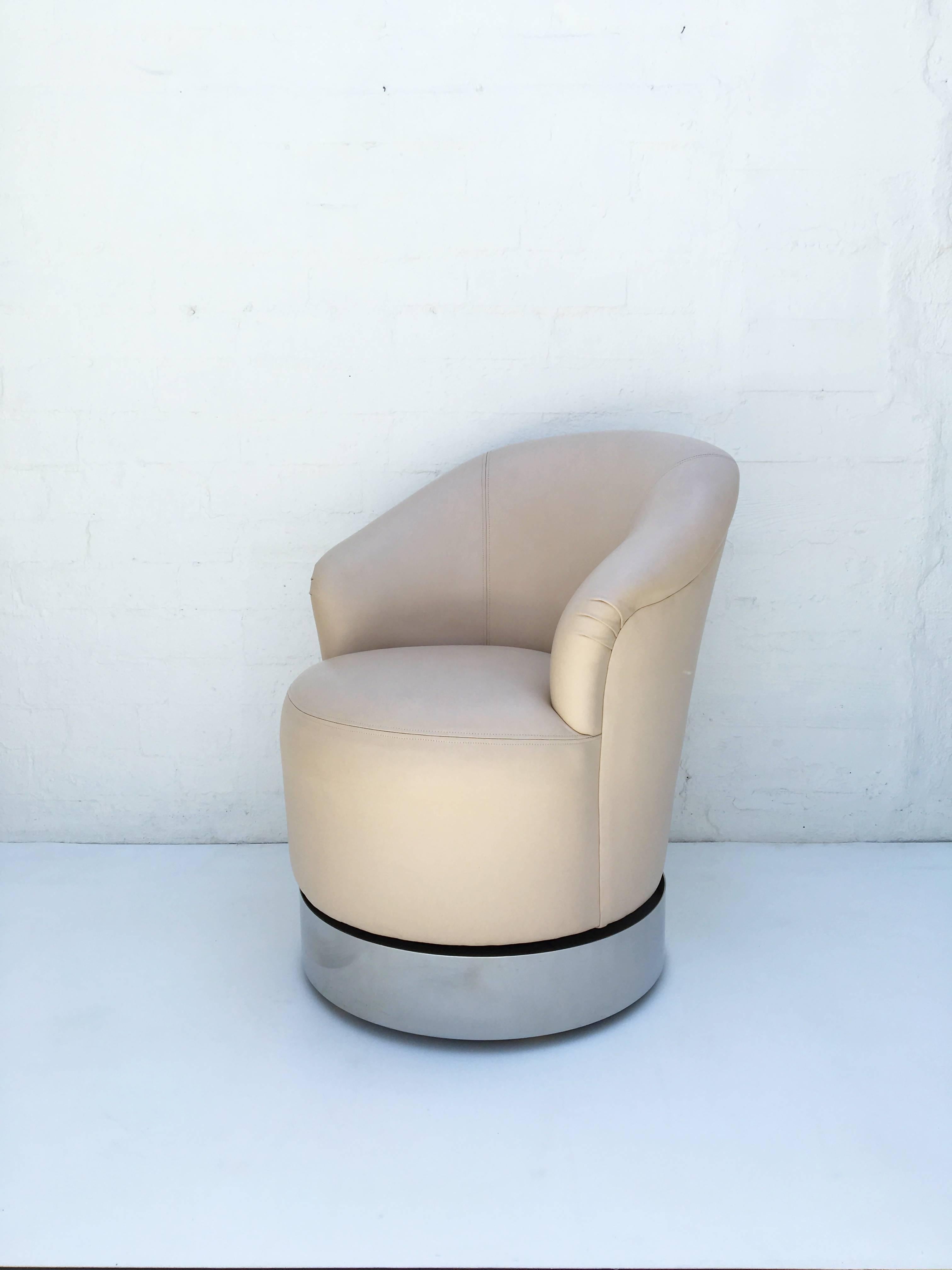 A set of four glamorous leather and chrome swivel chairs designed by Sally Sirkin Lewis for J. Robert Scott in the 1980s.
Perfect for a game table or just as lounge chairs.
They have casters for easy moving.