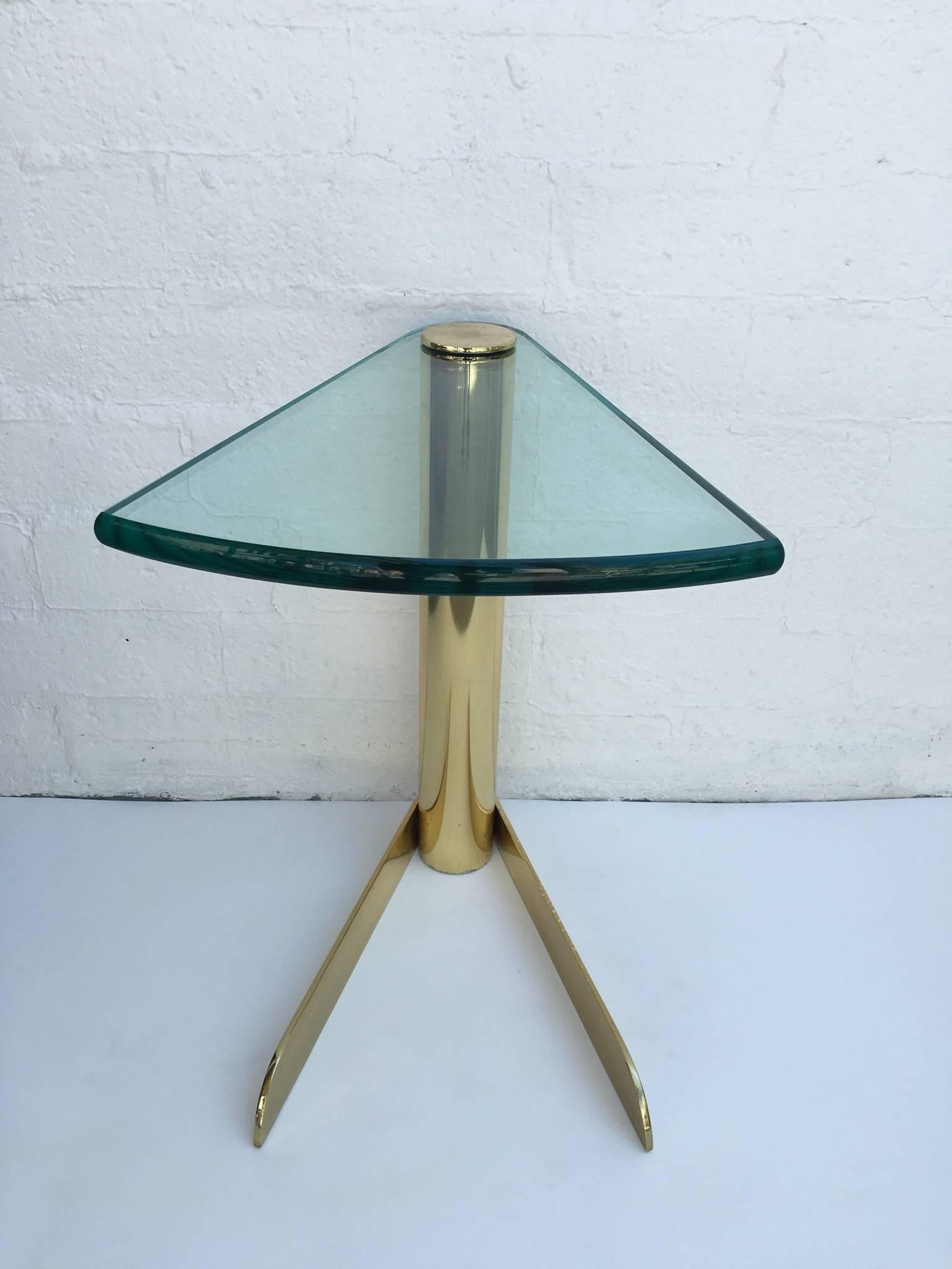 A glamorous brass and glass 1970s occasional table by Pace Collection.
The top is a 3/4