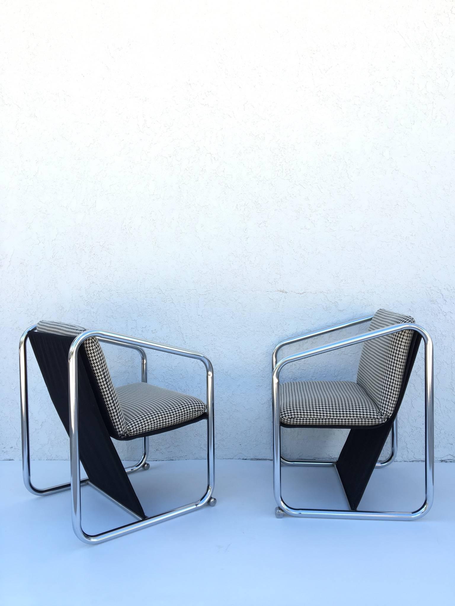 Rare pair of 1960s chrome Petite lounge chairs by Jerry Jonson. 
The chrome frame shows some age. (See detail photos). 
Newly upholster houndstooth pattern fabric black velvet sling.
 