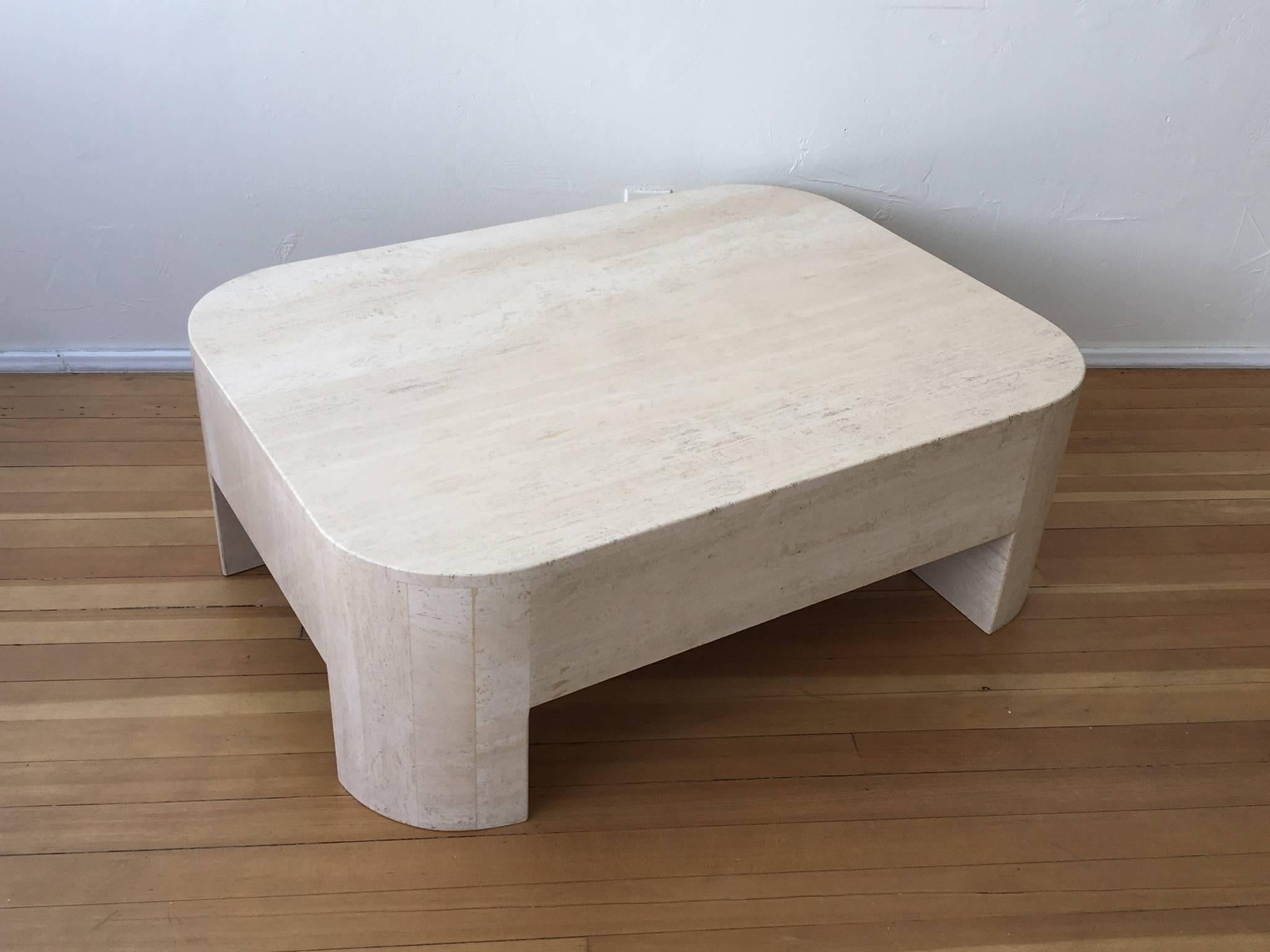 A 1970s polished Italian travertine cocktail table. Newly professionally polished.
Overall dimensions: 48