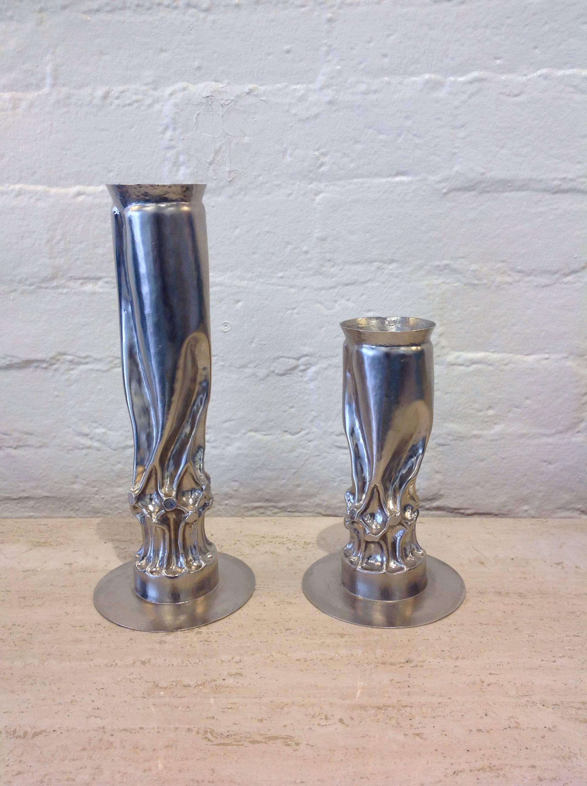A pair of sculpted pounded nickel plated Candle holder/ vases by Thomas Roy Markusen Brutalist. 
Large-15