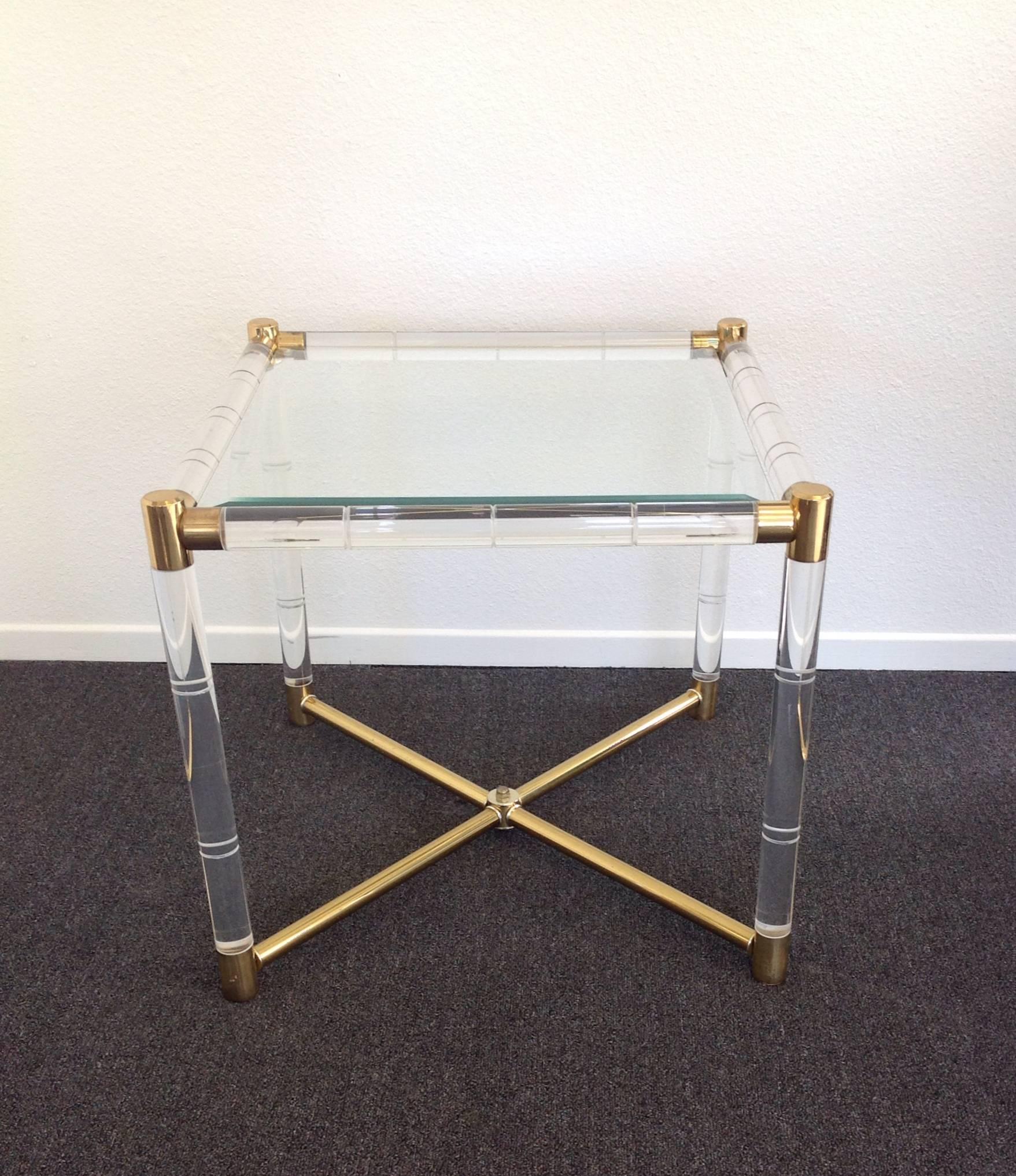 A glamorous acrylic and brass with a bevelled glass top side table design by Charles Hollis Jones in 1960s from his 