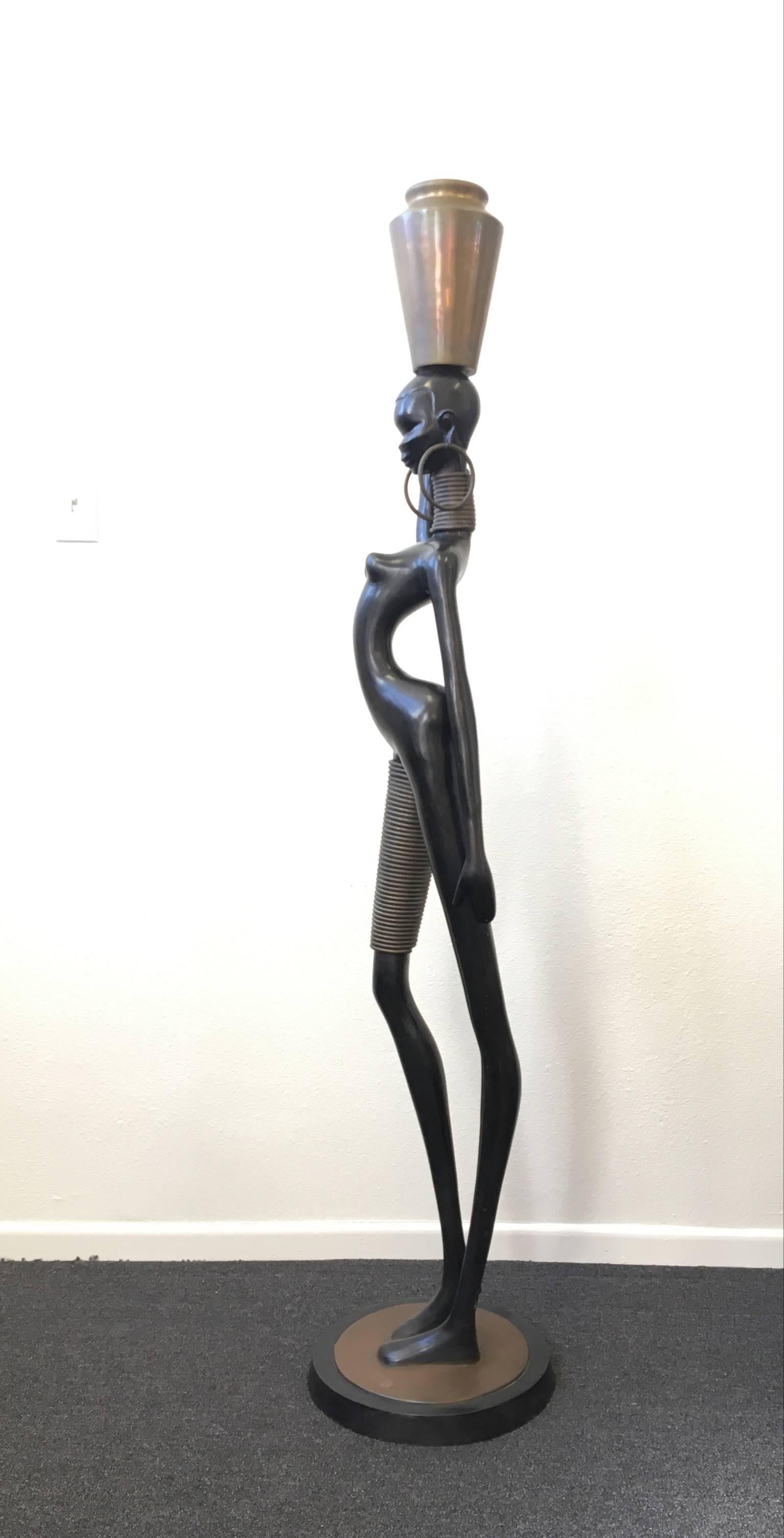 A beautiful 1950 large Ndebele woman aged bronze sculpture in the manner of Hagenauer. The sculpture is in excellent condition with its original patina.