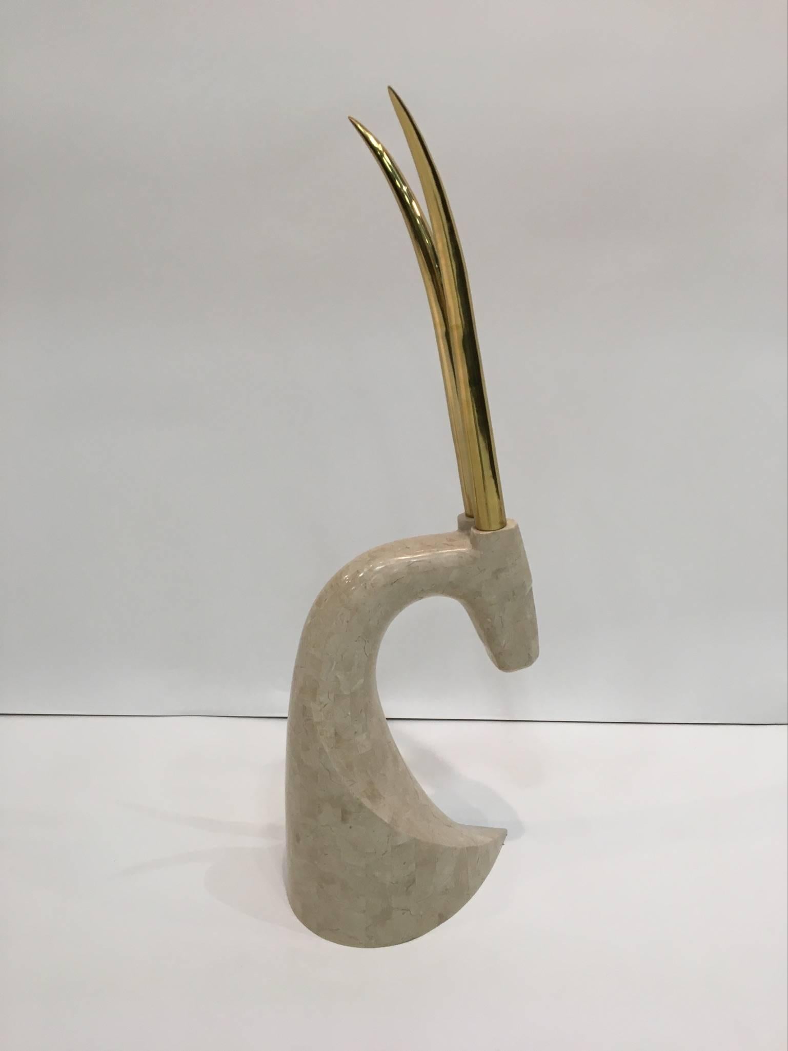 A glamorous tessellated polished travertine and polished brass antelope sculpture by Maitland Smith, circa 1970s.
The brass shows some minor age. 
Dimensions: 36