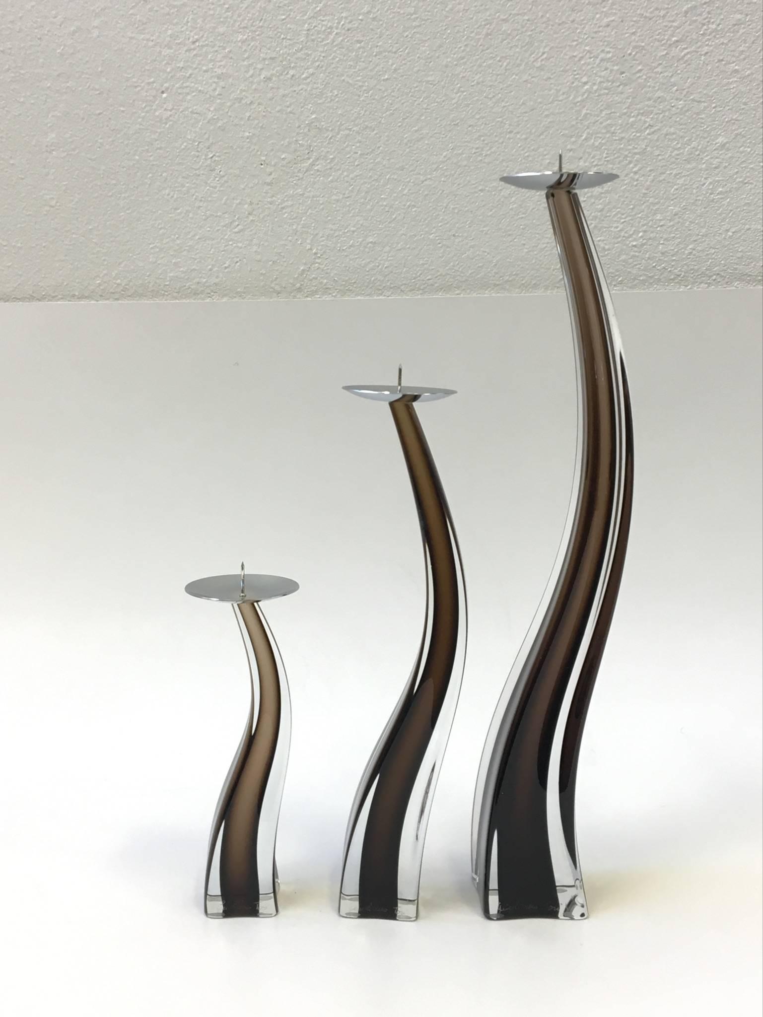 A set of three handblown Murano glass candlesticks designed by Giuliano Tosi for Oggetti in the 1980s.
All three candle sticks are signed by Giuliano Tosi and retain the Oggetti tag.
Dimensions:
Large 17.5